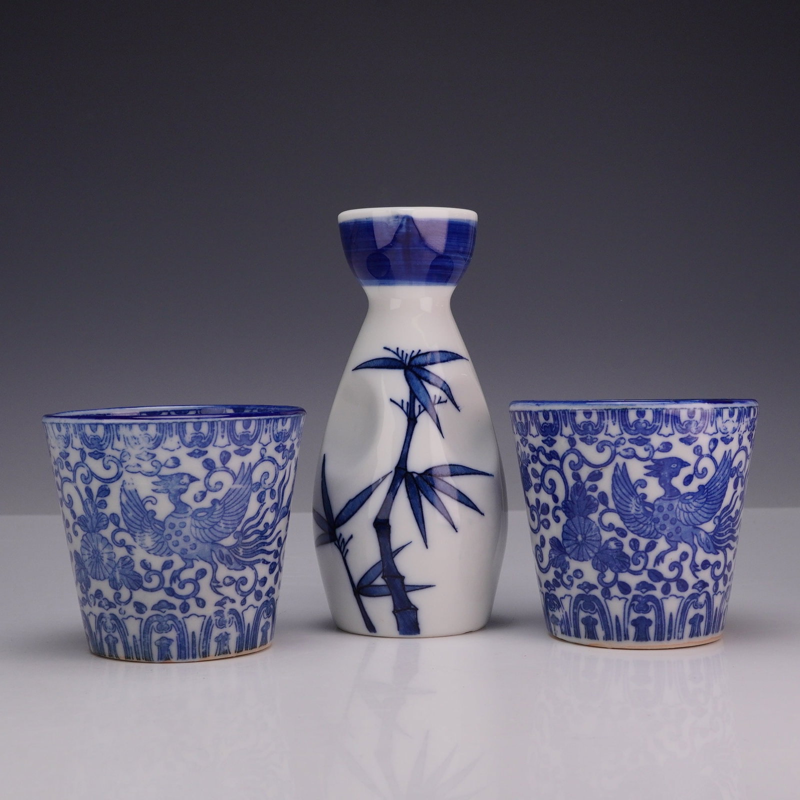 Three-piece Japanese Blue and White Porcelain Sake Set with Bamboo and Phoenix Motifs (1 of 3)