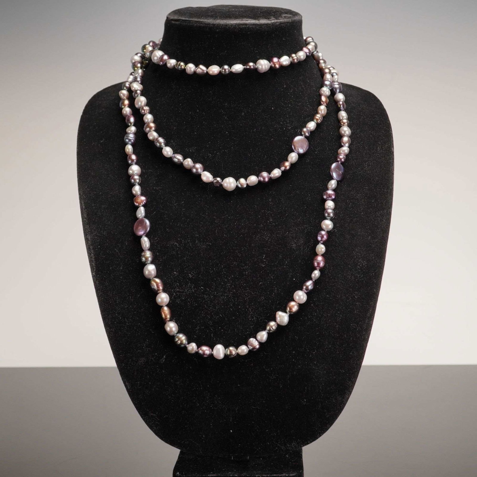 Honora Collection Multi-Color Baroque Freshwater Pearl Necklace with Sterling Silver Clasp: A single-strand necklace from the Honora Collection featuring multi-colored cultured freshwater pearls. The pearls are baroque in shape, displaying organic potato and rice forms with visible natural s