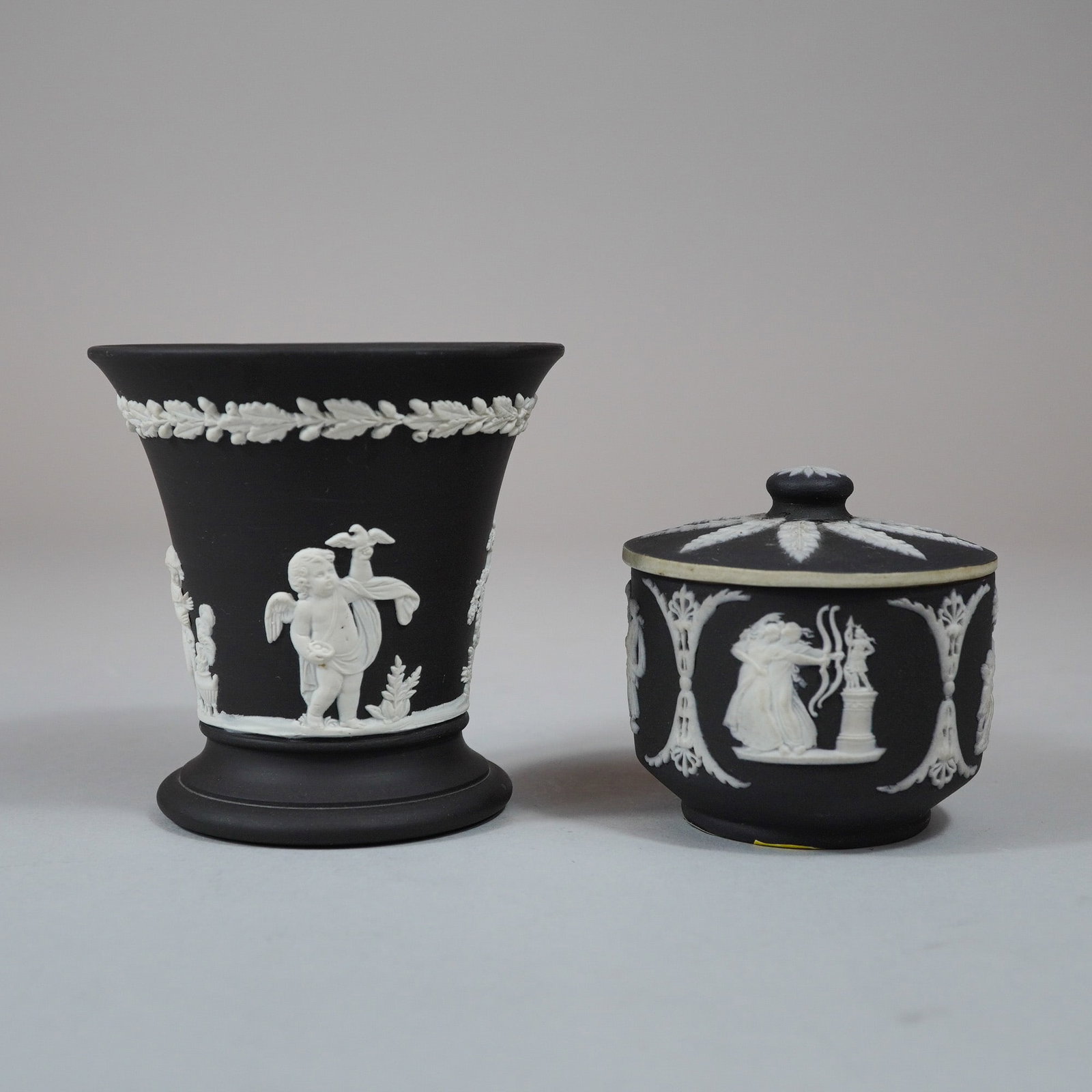 Two Wedgwood Black Jasperware Ceramic Items Including a Lidded Pot and a Spill Vase (1 of 3)