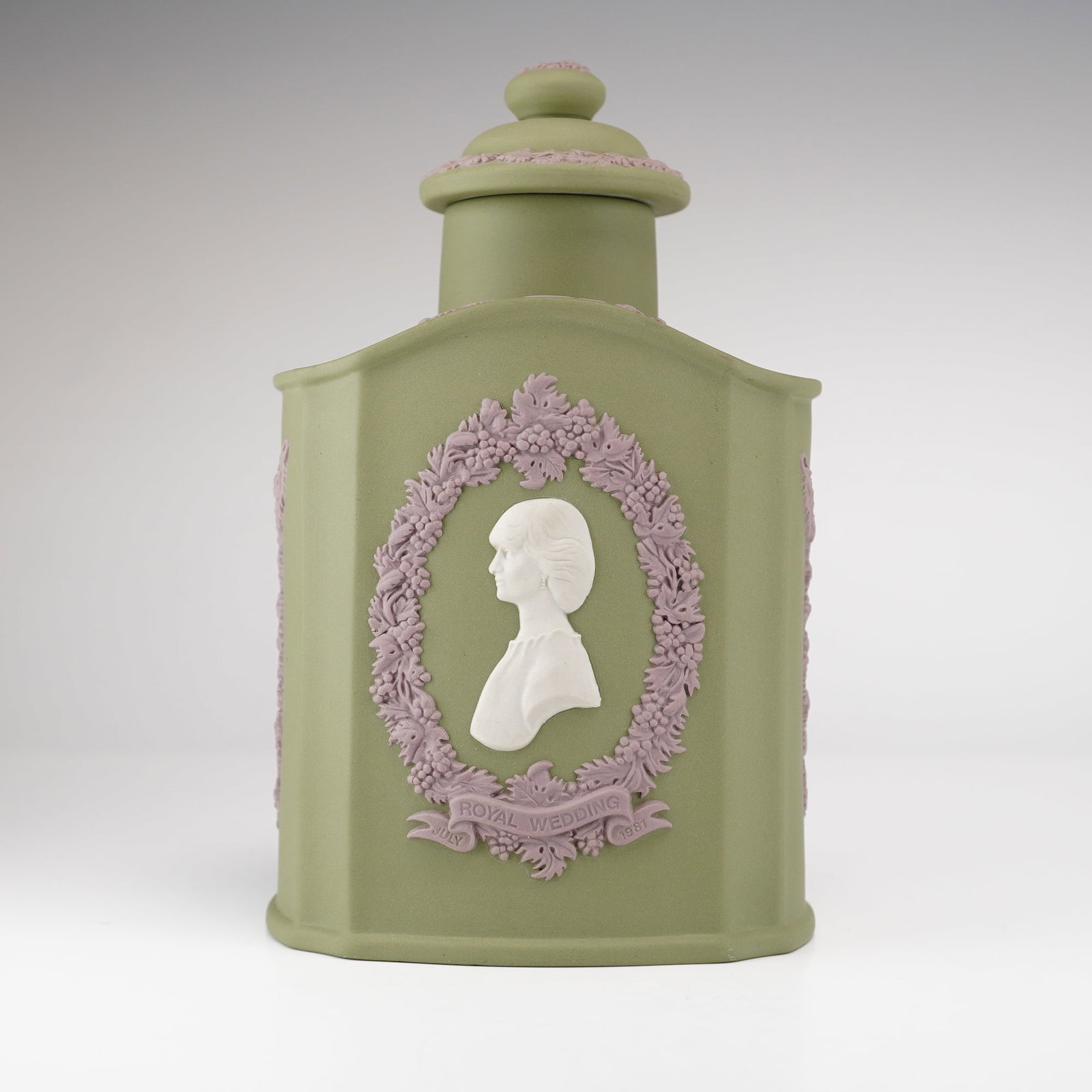 Wedgwood Tricolor Jasperware 1981 Royal Wedding Commemorative Tea Caddy: This lidded tea caddy, or teapoy, was manufactured by Wedgwood to commemorate the July 1981 Royal Wedding of Prince Charles and Lady Diana Spencer. The piece is crafted from tri-color jasperware, feat