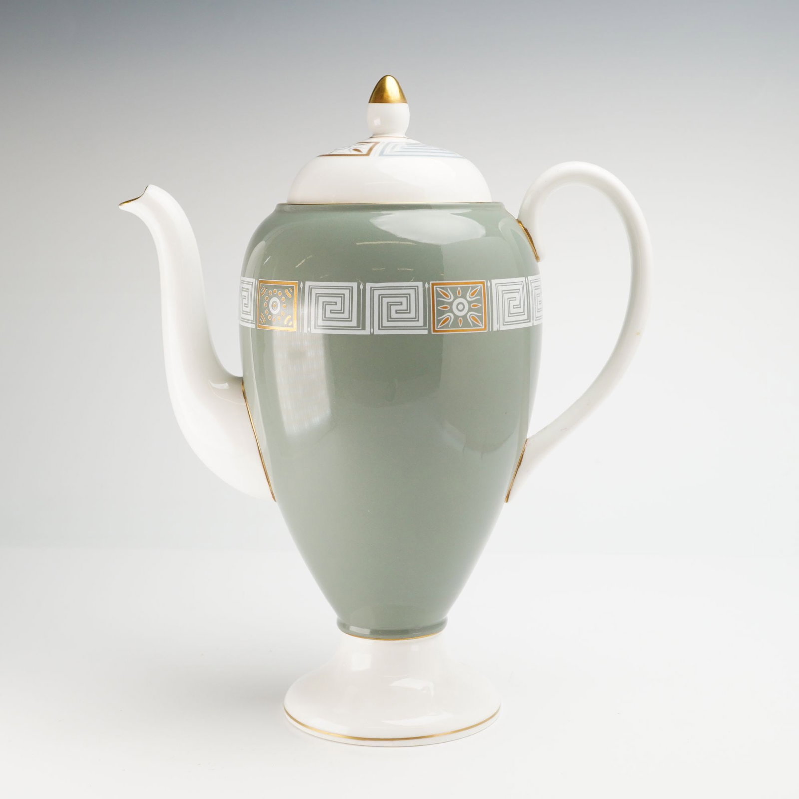 Wedgwood Asia Pattern R4310 Bone China Lidded Teapot: This lidded teapot is manufactured by Wedgwood in the Asia pattern, specifically pattern number R4310. The vessel is constructed of fine bone china and features a tall, ovoid body resting on a flared 