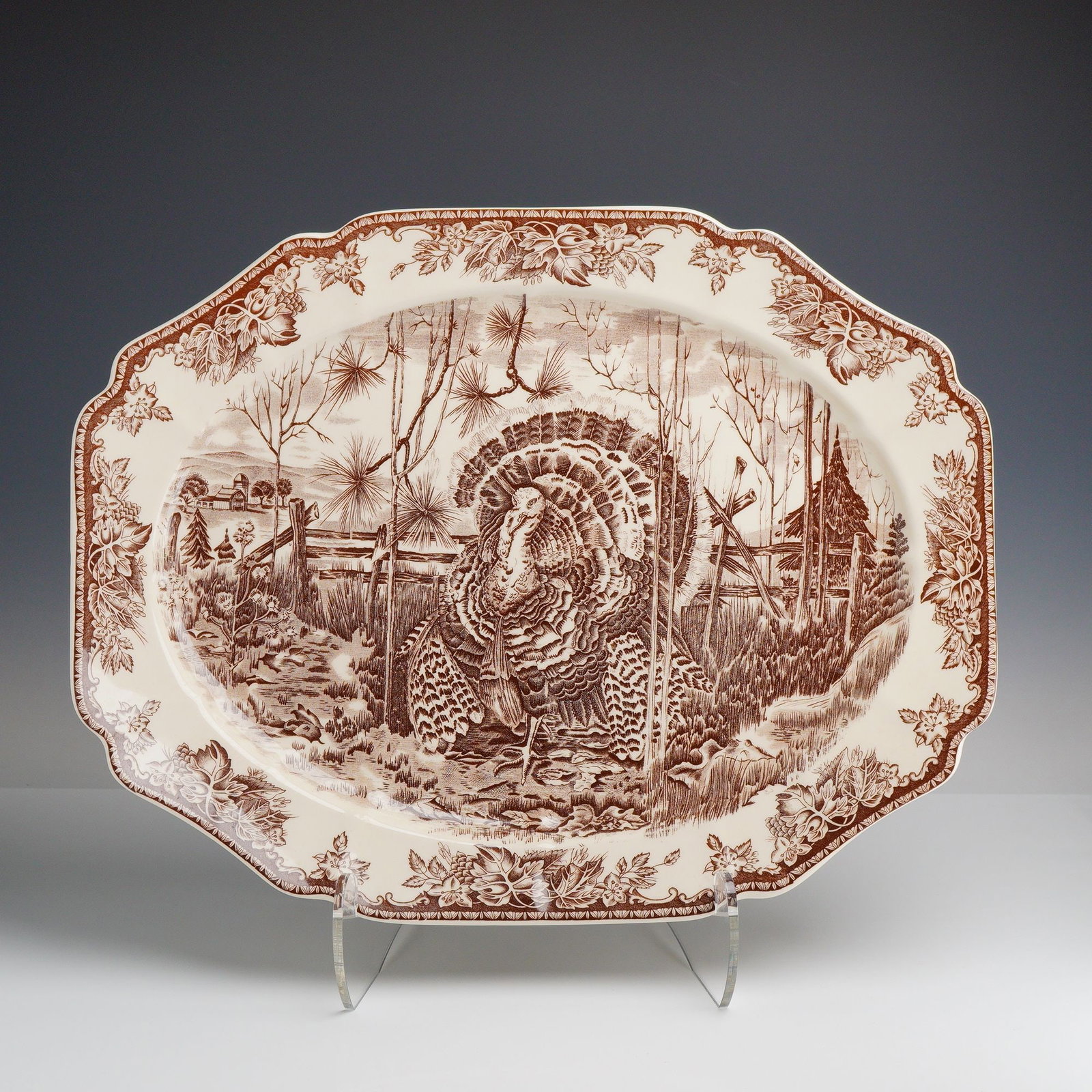Wedgwood for Williams-Sonoma His Majesty Pattern Turkey Serving Platter: A large earthenware serving platter manufactured by Josiah Wedgwood and Sons, Ltd. in England. Produced in 1999 exclusively for the retailer Williams-Sonoma, the platter features the His Majesty patte