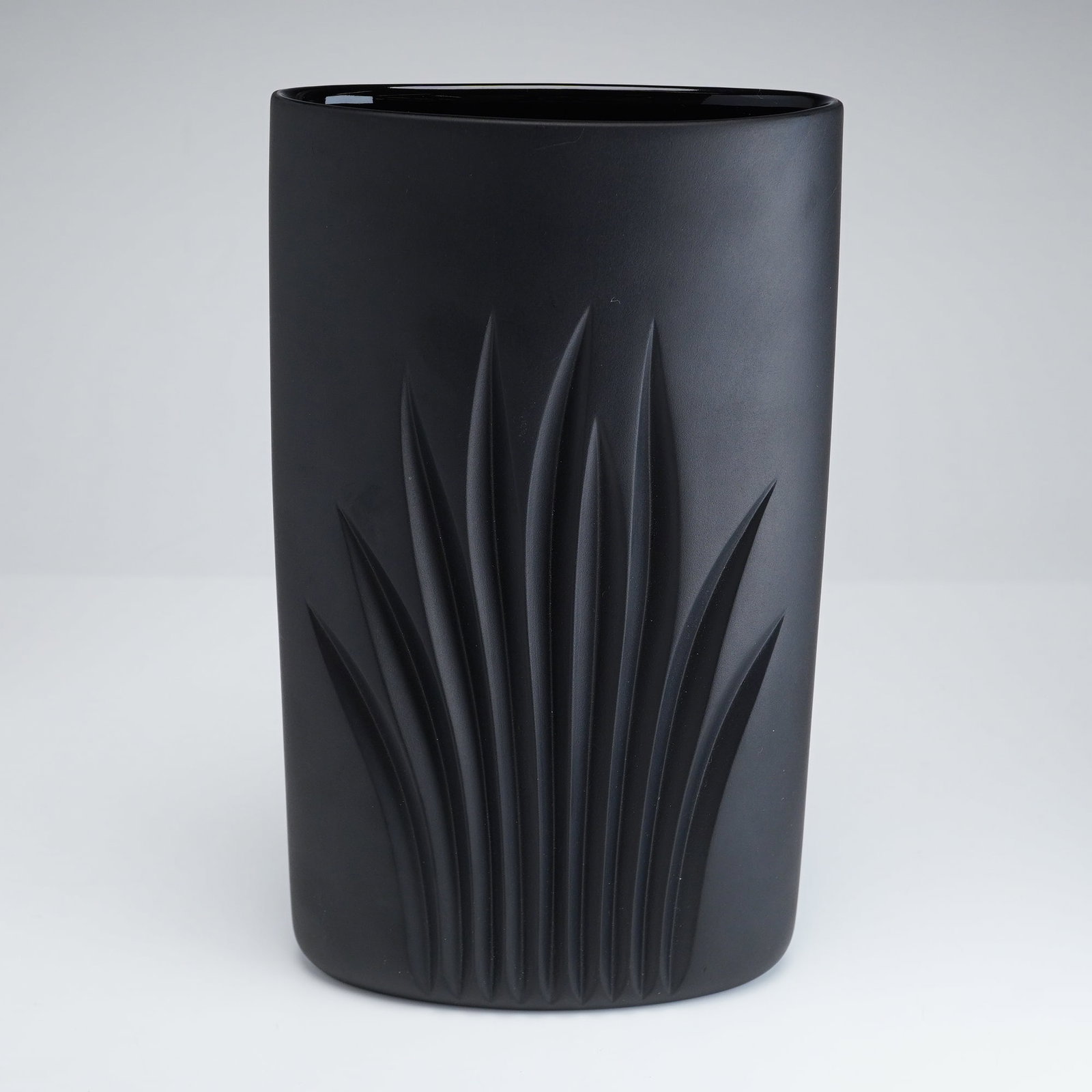 Rosenthal Studio-Linie Matte Black Foliage Porcelain Vase by C. J. Riedel: This porcelain vase is part of the Rosenthal Studio-Linie collection and features the Foliage pattern designed by Claus Josef Riedel. The piece is constructed from matte black bisque porcelain and is 