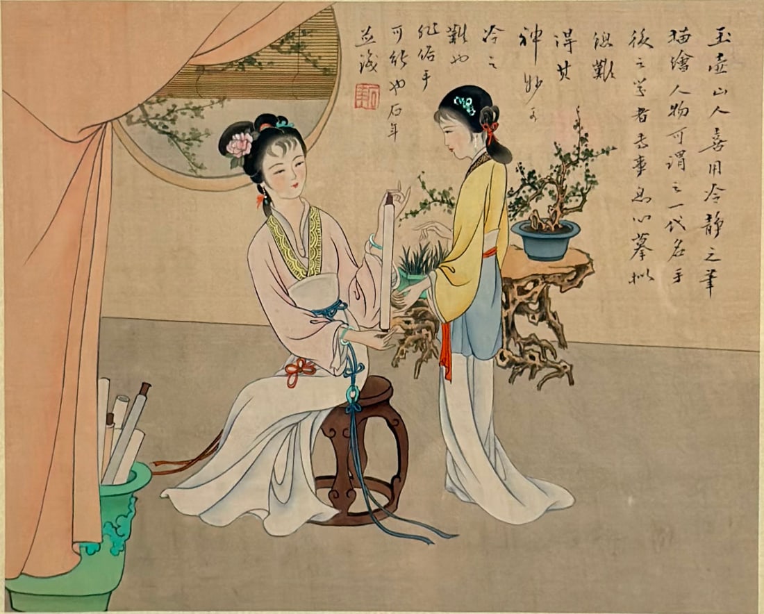 Chinese Print Depicting Two Women in Traditional Clothing: This artwork is a framed Chinese print depicting two women in traditional clothing engaged in refined activities within a scholar's studio. One woman is seated on a dark wood barrel stool holding a ve
