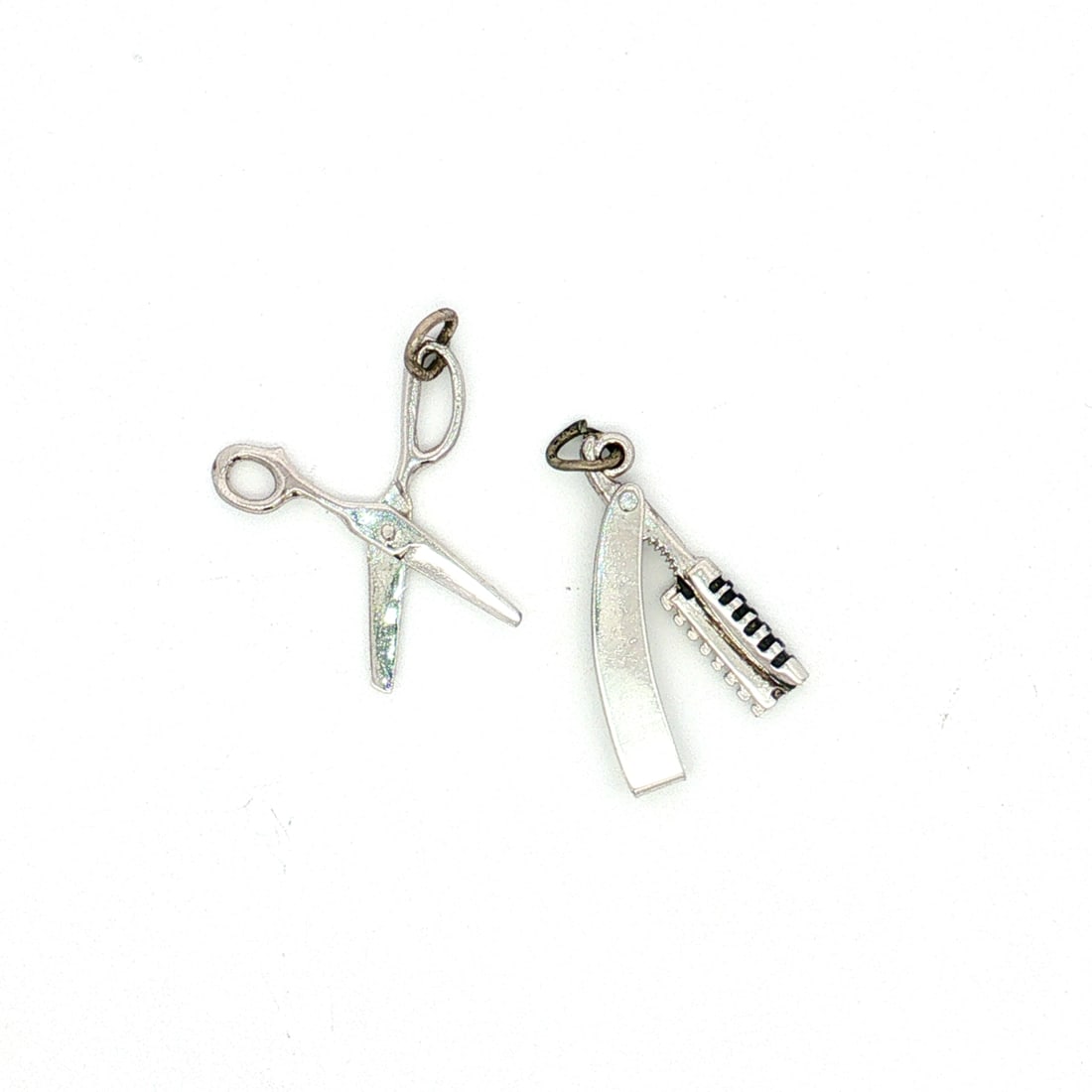 2pc Sterling and Non-Sterling Barber Charms (1 of 3)