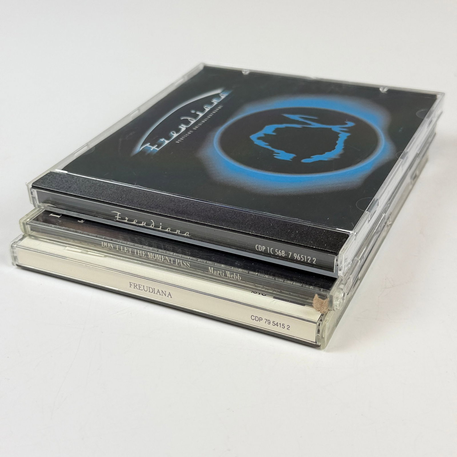3pc Freudiana Compact Discs Including Studio Album Cast Recording and Single: This lot consists of three compact discs related to the Freudiana musical project, a conceptual collaboration between Eric Woolfson and Alan Parsons, the principal members of The Alan Parsons Project.