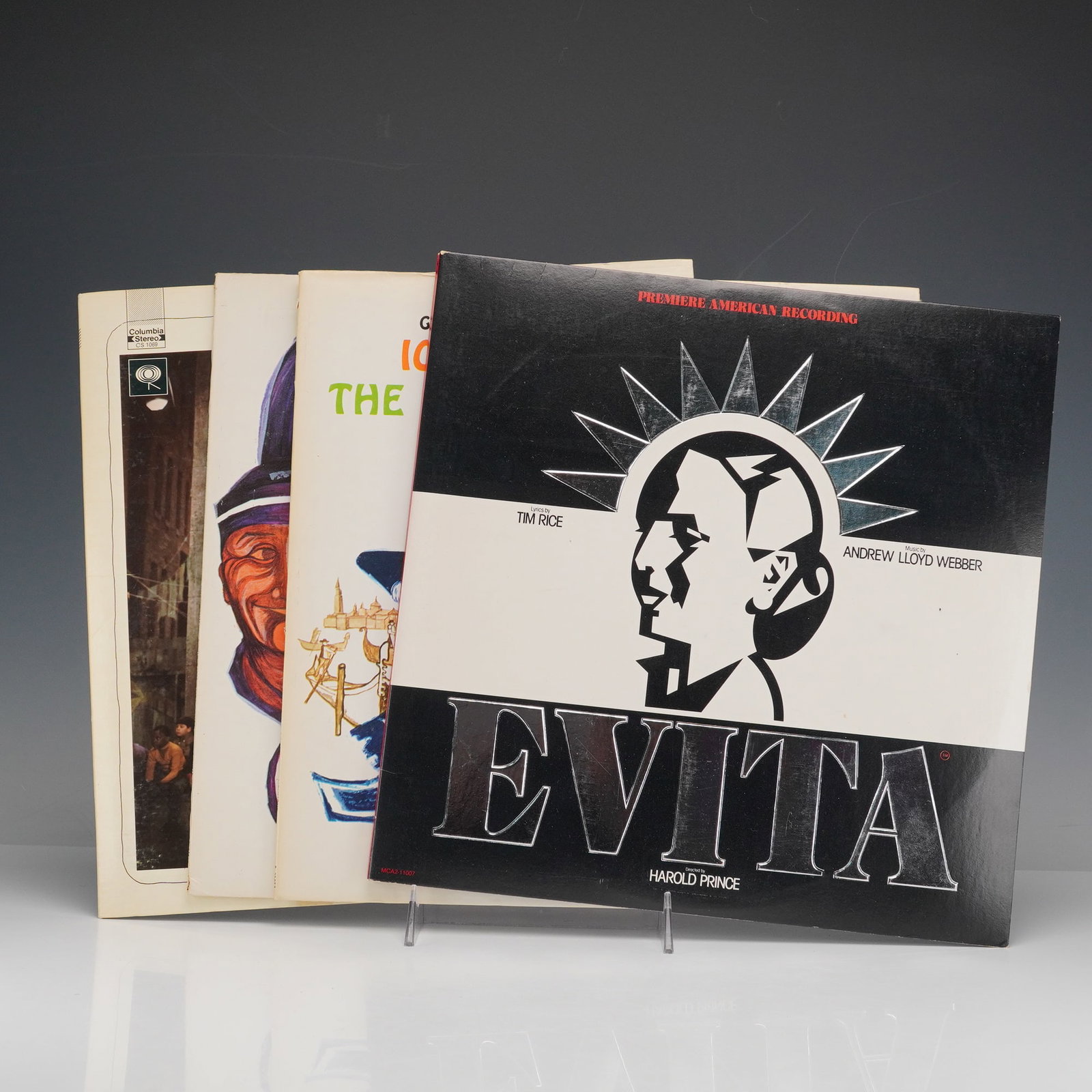 4pc Musical Record Set: Sesame Street, Evita, Iolanthe, Patience & Mikado: This 4-piece musical record set includes Sesame Street Book & Record with Original Cast, a lively album featuring the classic characters; Gilbert & Sullivan's Iolanthe & The Gondoliers, a celebrated d
