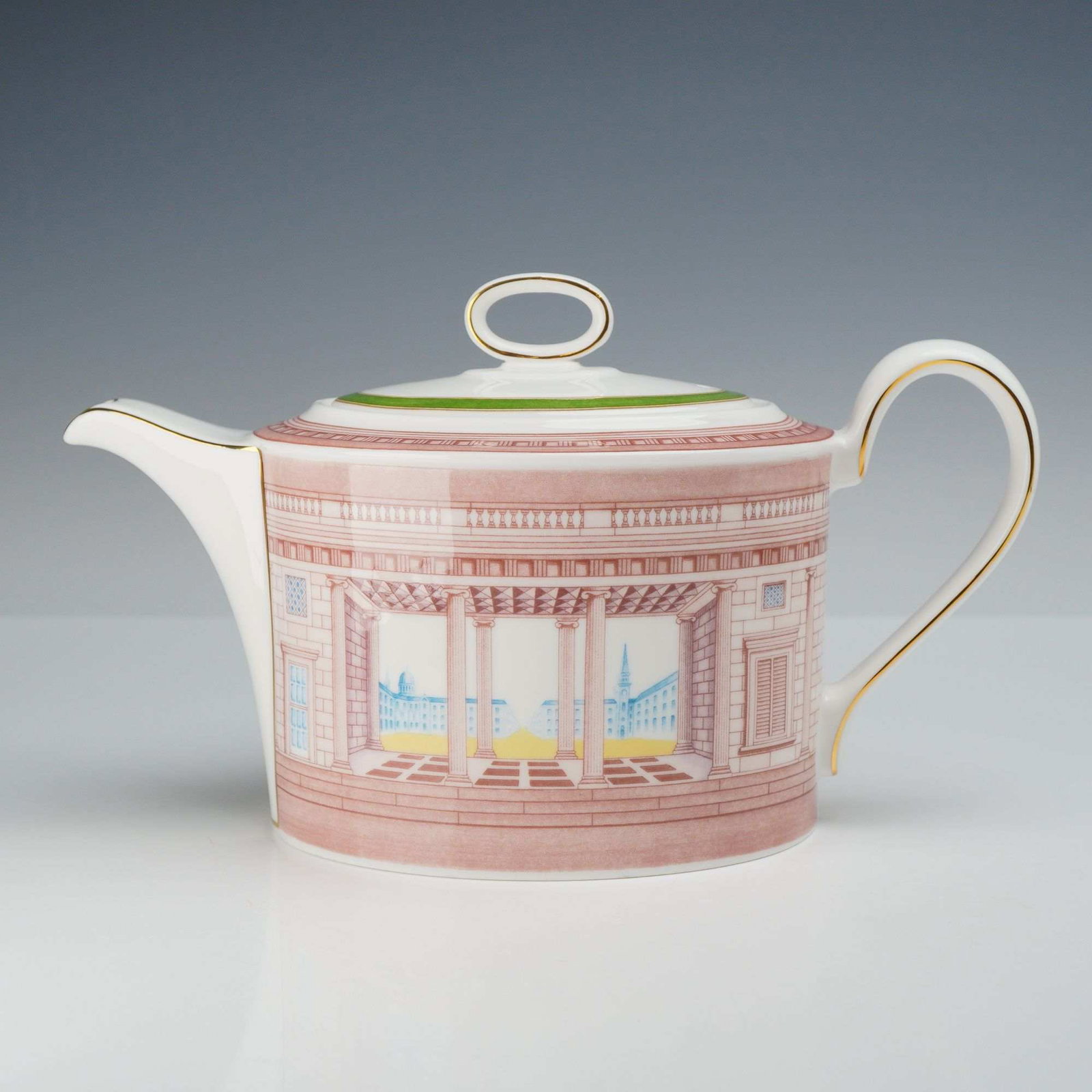 Wedgwood Susie Cooper Classic Vista Bone China Teapot: A Wedgwood fine bone china teapot in the Classic Vista pattern, designed by Susie Cooper. The vessel features a rounded, oval-profile body with a tapered spout and a loop handle. The exterior is decor