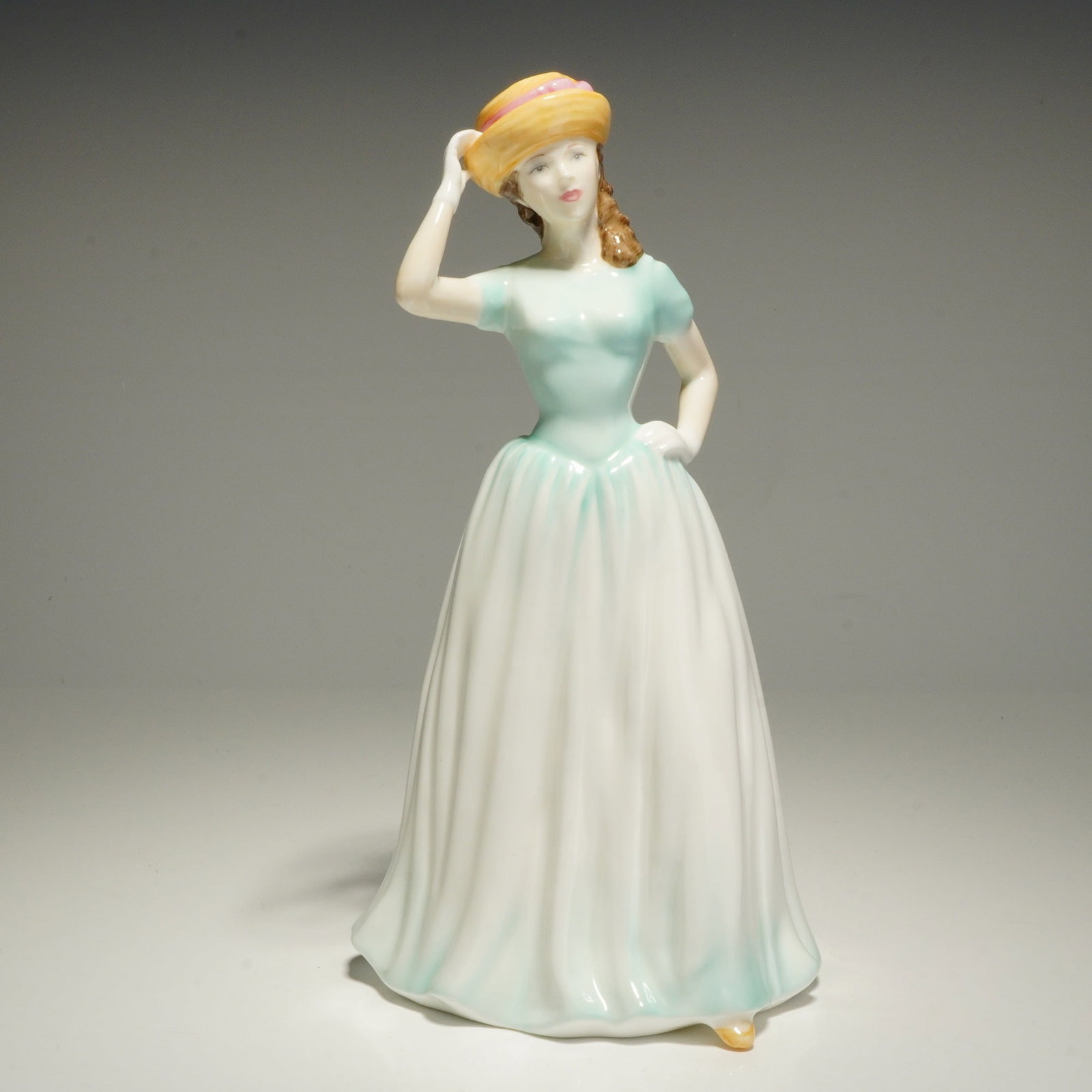 Royal Doulton Classics Happy Birthday 2001 Figurine HN4308: This Royal Doulton figurine from the Happy Birthday collection, model HN4308, is part of the Classics series. Modeled by Nada M. Pedley and issued in 2001, the piece is constructed of hand-decorated b