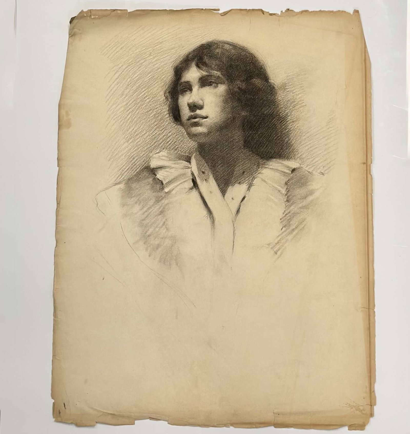 Angelo Comolli (Italian, 1863-1949), Portrait of a Young Woman, ca. 1911-1913: This original charcoal and graphite drawing on toned wove paper is by the Italian artist Angelo Comolli (1863-1949). The work was produced approximately between 1911 and 1913 and comes from the artist