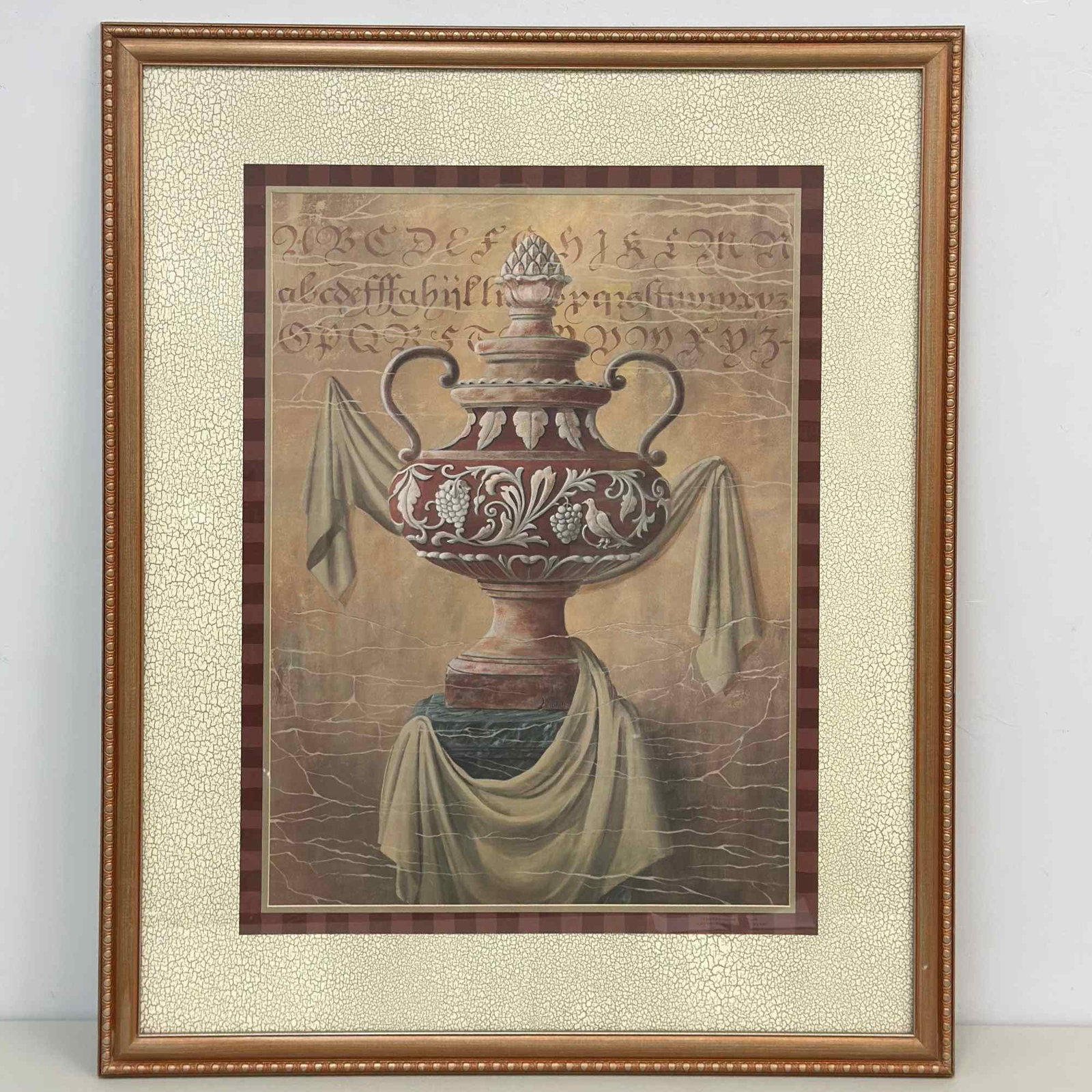 Gloria Eriksen Ancient Urn II Framed Print on Paper: This contemporary decorative work is a print on paper by artist Gloria Eriksen, titled Ancient Urn II. The composition features a classical two-handled vessel in a Neoclassical style, decorated with r