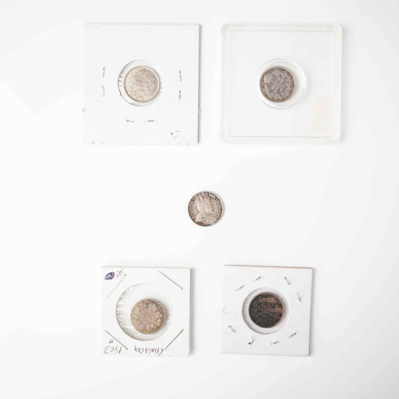 5pc 1902, 1903, 1911, 1917, 1920 Canada Silver 5 Cent: A group of five Canadian 5 cent silver coins spanning the reigns of Edward VII and George V, comprising dates 1902, 1903, 1911, 1917, and 1920. Each piece was engraved by Leonard Charles Wyon and Geor