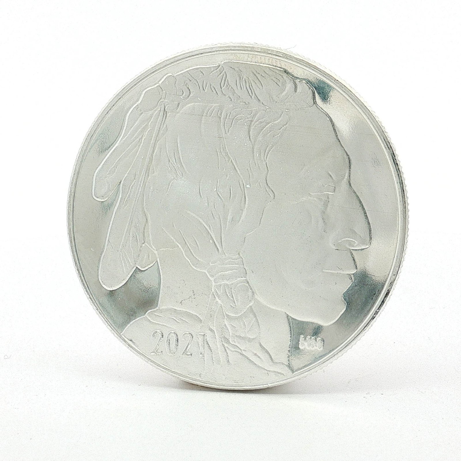 2021 Highland Mint 1 Troy Ounce Silver Bullion Round Coin: Each round is produced with .999 fine silver. Obverse is similar to James Earle Fraser's portrait of a Native American chieftain, facing right, with HM mark lower right. Reverse features a profile vie