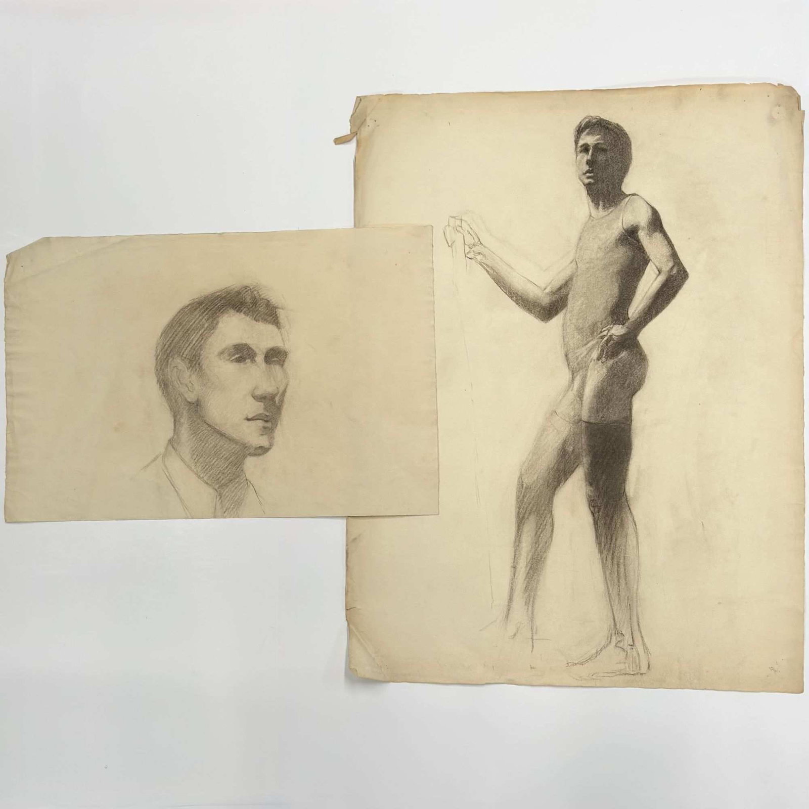 2pc Angelo Comolli (Italian, 1863-1949), Male Study Drawings on Paper: This pair of original drawings on paper was executed by Angelo Comolli (Italian, 1863-1949) while at the Eric Pape School of Art in Boston, circa 1911-1913. Both works are rendered in charcoal or soft