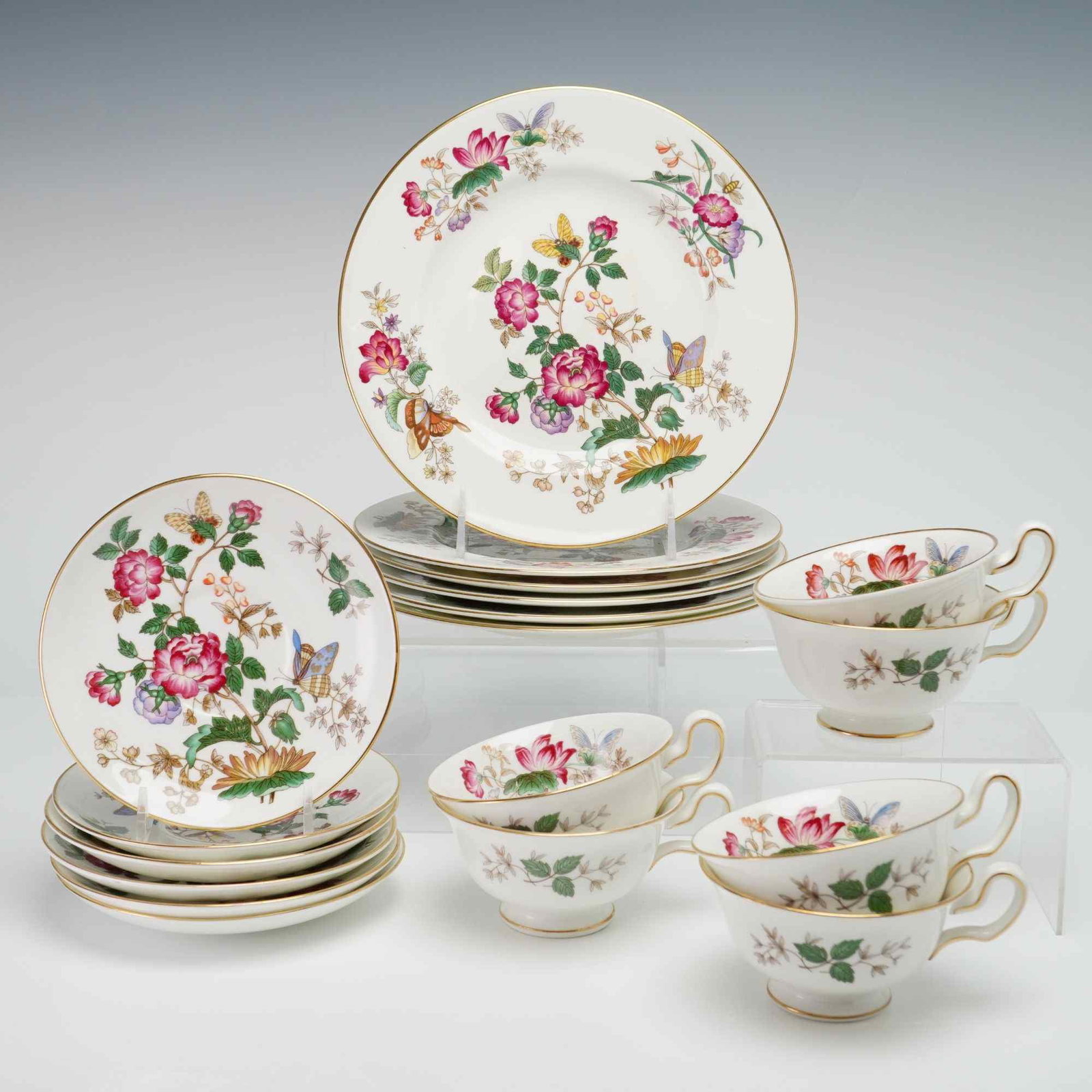 18-Piece Wedgwood Bone China Cups, Saucers & Dessert Plates- Charnwood: Service for six dessert service is manufactured by Wedgwood in the Charnwood pattern, identified by pattern number WD 3984. The set is constructed of bone china and features transfer-printed floral sp