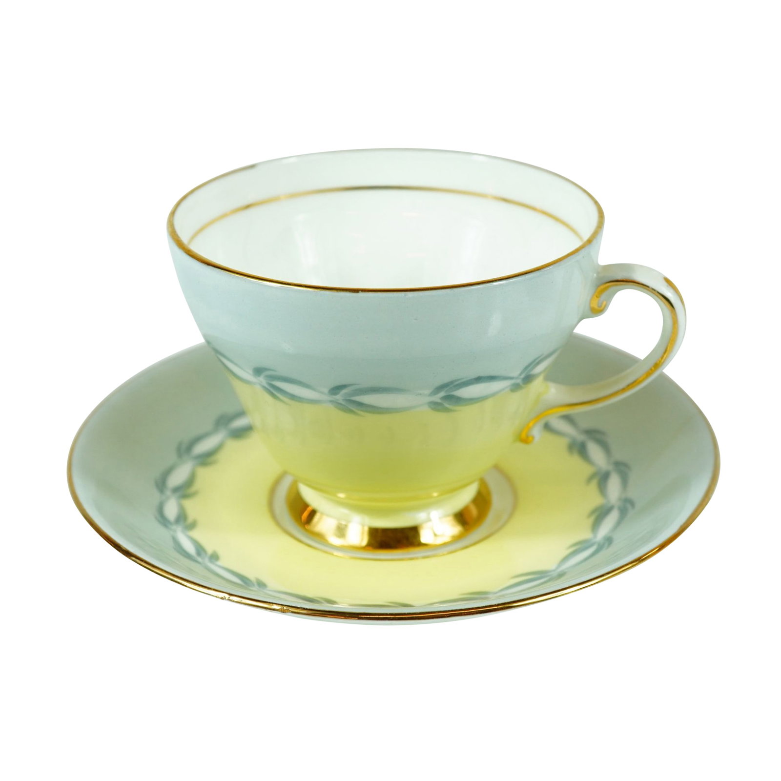 2pc Royal Grafton Bone China Cup and Saucer Set 2208: A Royal Grafton fine bone china teacup and saucer set featuring a two-tone color scheme. The set consists of a pedestal-style teacup with a C-scroll handle and a matching circular saucer. The decorati