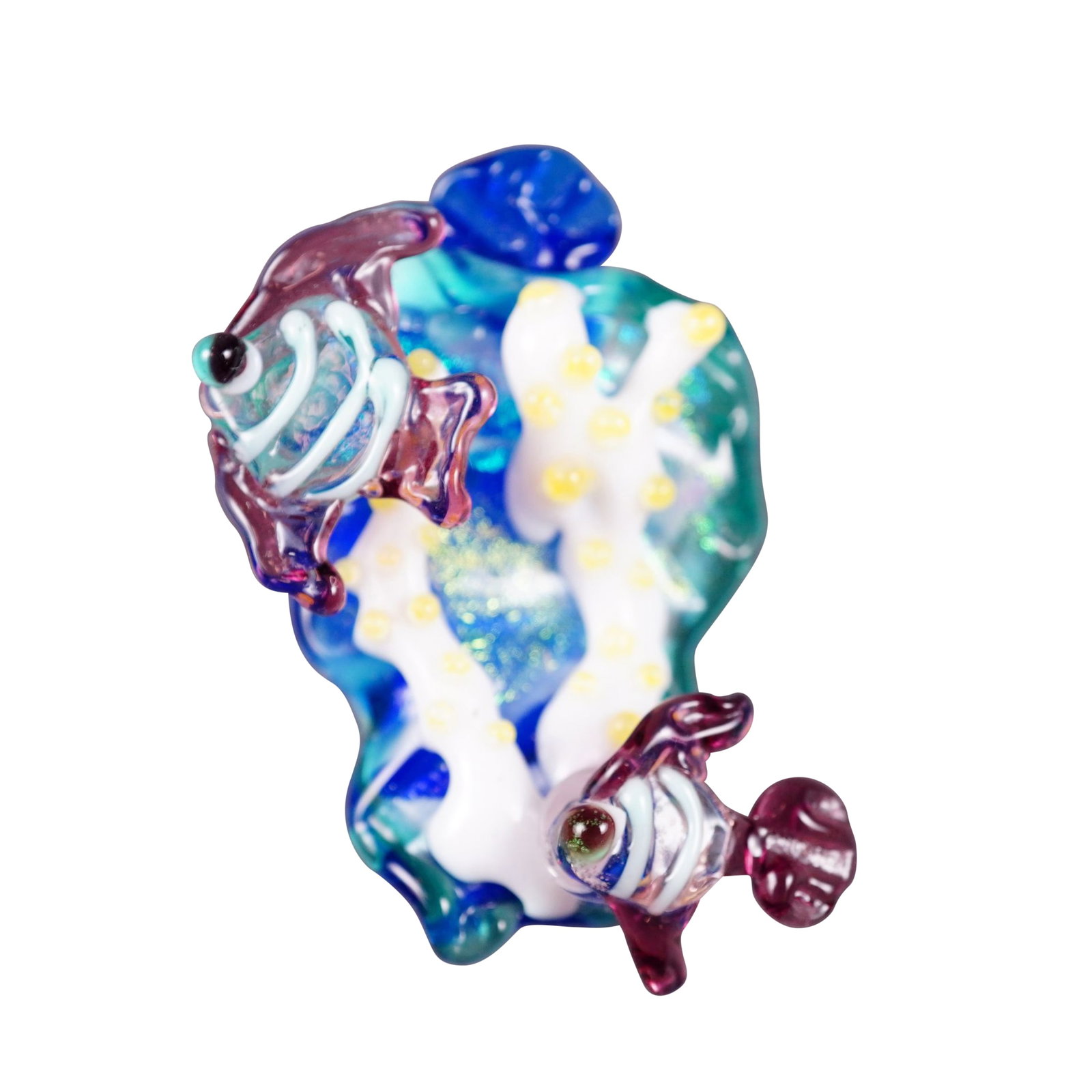 Studio Artist Lampwork Glass Aquatic Fish Button: A hand-crafted studio glass button featuring an intricate lampwork aquatic scene. The surface is expertly sculpted with two amethyst-toned striped fish swimming amidst a white branching coral reef acc