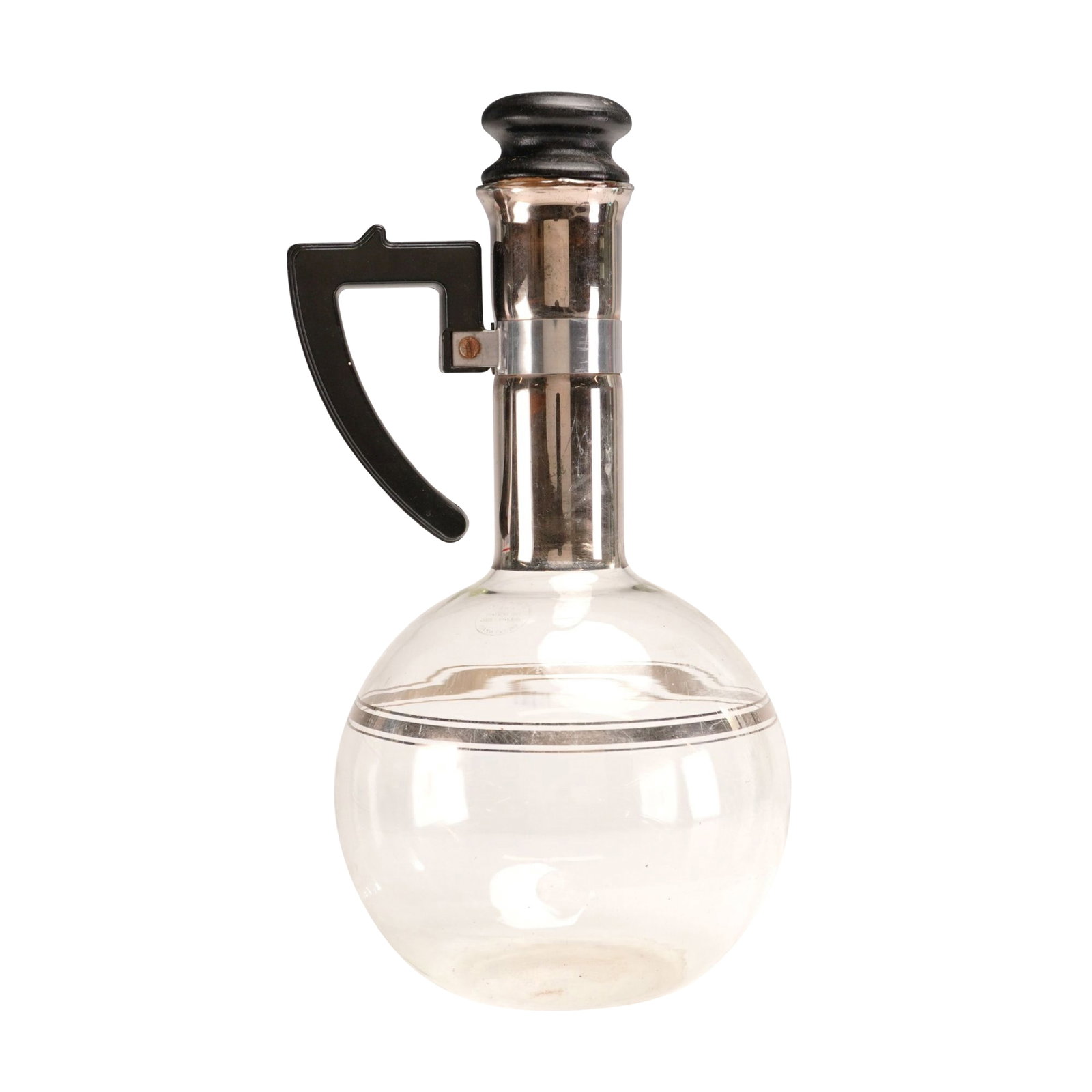 Inland Glass Works Art Deco XXX Hand Blown Glass and Silver Painted Carafe with Stopper: This Art Deco beverage carafe is produced by Inland Glass Works of Chicago, Illinois. It features a hand-blown heat-resistant clear glass spherical body accented with two horizontal silver-toned metal