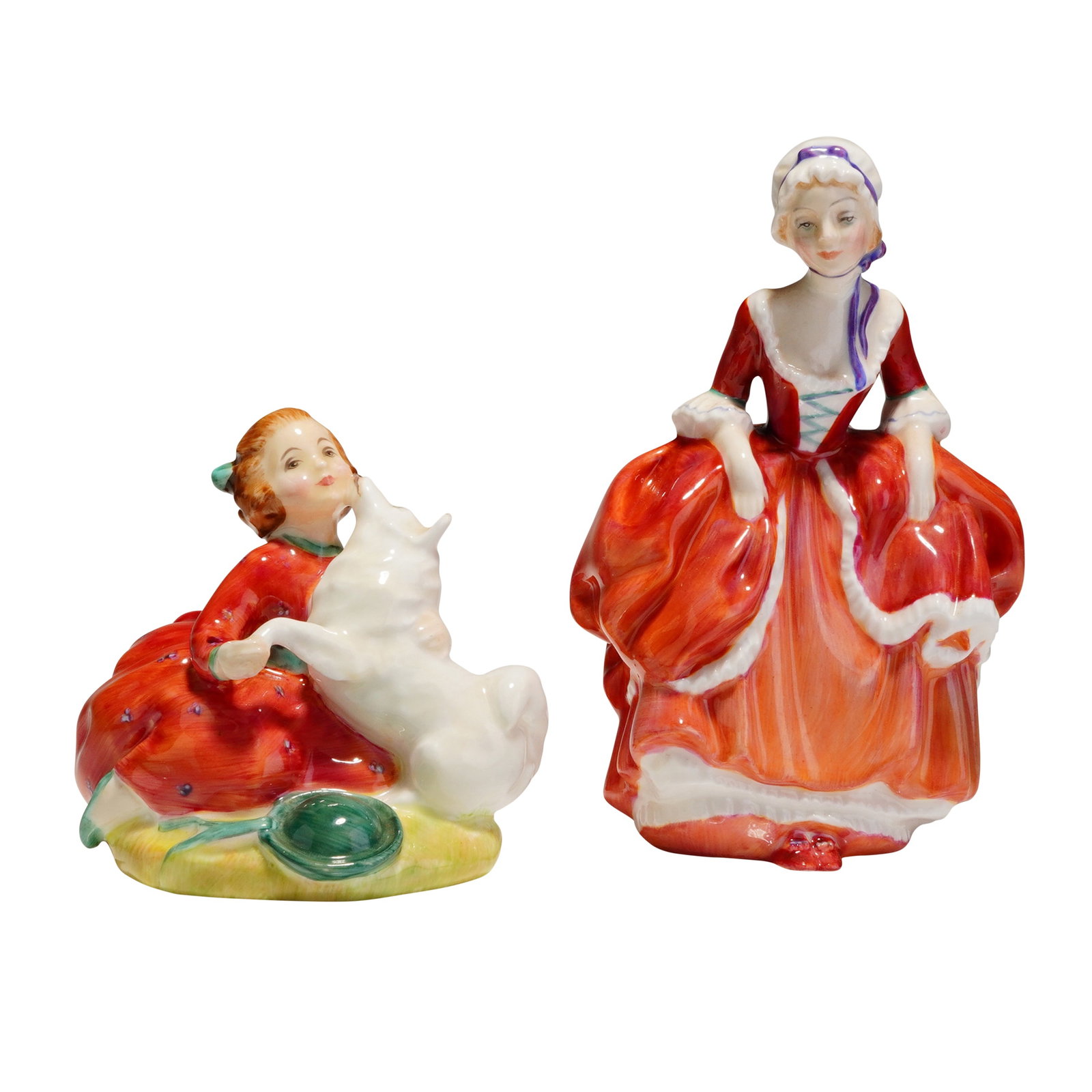 2pc Royal Doulton Figurines, Home Again HN2167 & Goody Two Shoes HN2037: A pair of glazed bone china figurines manufactured by Royal Doulton. The figures depict women in 18th-century style dress, decorated in vibrant polychrome glazes, primarily red and orange tones, with 