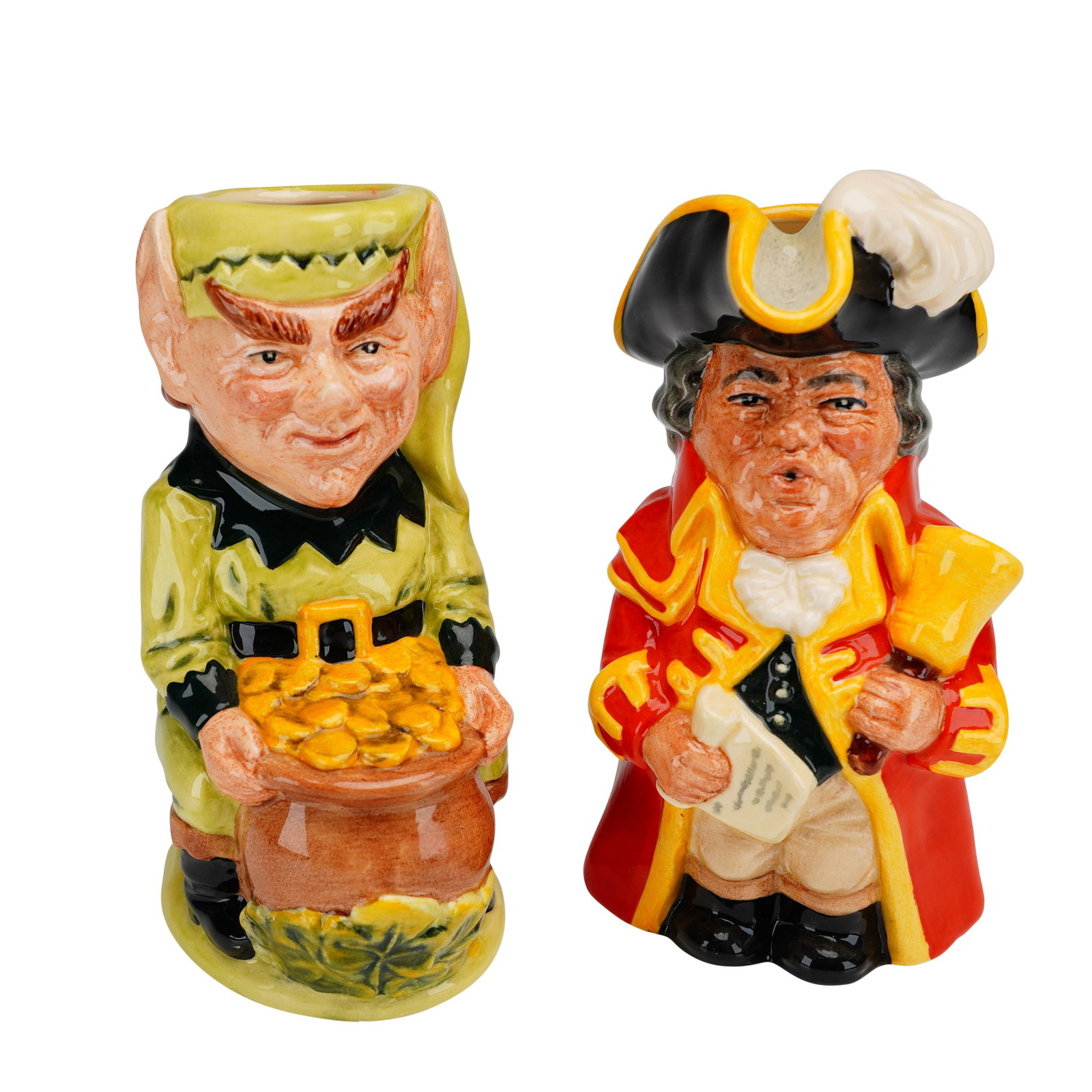 2pc Limited Edition Royal Doulton Toby Jugs: Two Royal Doulton limited edition character jugs, including Town Crier D6920 and Leprechaun D6948. These hand-decorated ceramic Toby jugs were modeled by Stanley James Taylor and produced in England. 