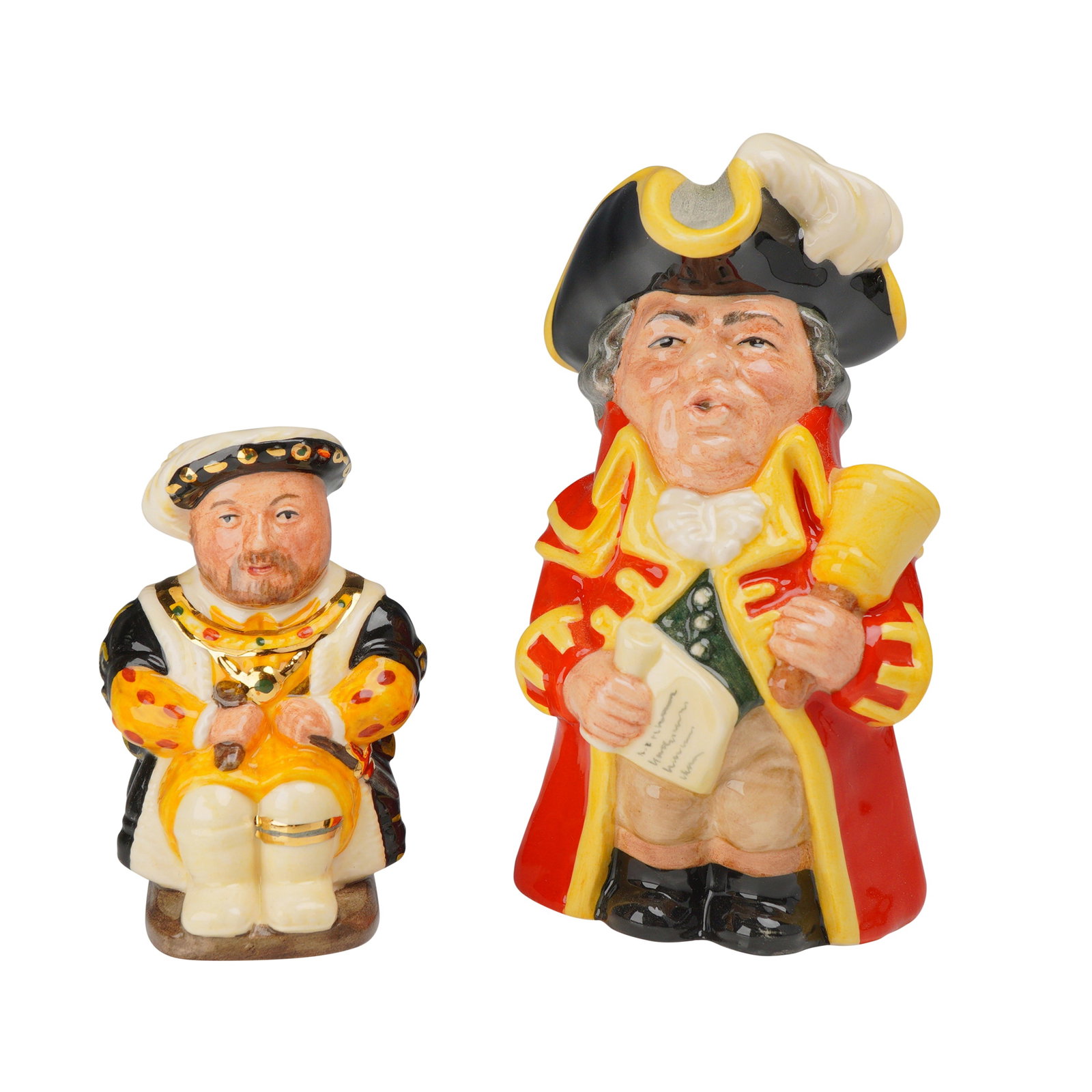 2pc Royal Doulton Limited Edition Character Toby Jugs Town Crier D6920 and King Henry VIII D7047: This lot features two limited edition character jugs produced by Royal Doulton. Both pieces are crafted from glazed ceramic with hand-painted polychrome details and gilded accents. The first jug depic