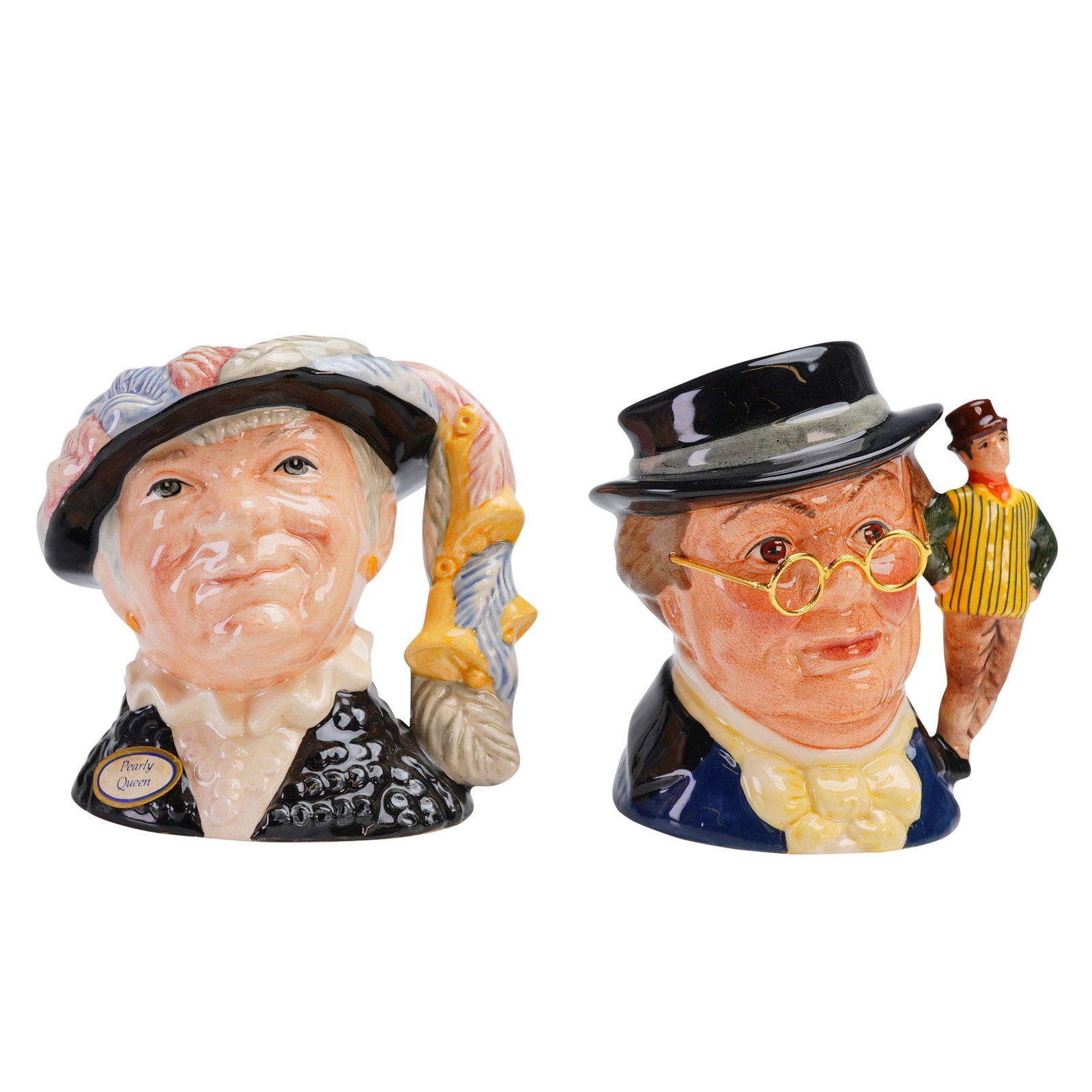 2pc Royal Doulton Small Character Jugs, D6843 and D7025: Jugs include the Pearly Queen D6843 small character and the Mr Pickwick D7025 small character jug. The Pearly Queen model was modeled by Stanley James Taylor and is dated 1986, depicting a woman in tr