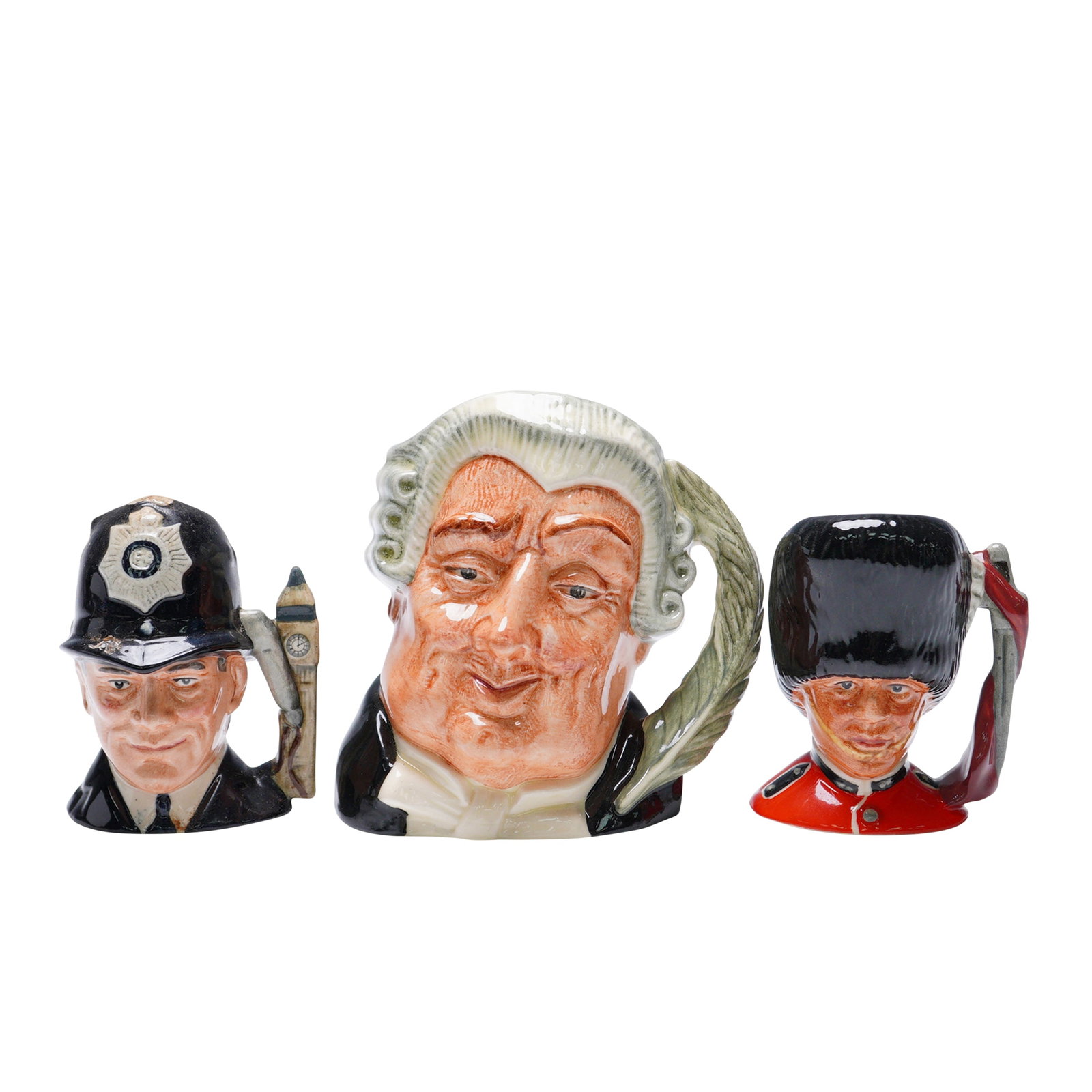 3pc Royal Doulton Character Jugs, Icons of British Authority: A trio of Royal Doulton character jugs representing the pillars of British authority and tradition. This grouping includes the London Bobby (D6763), a classic depiction of the city's iconic policeman;