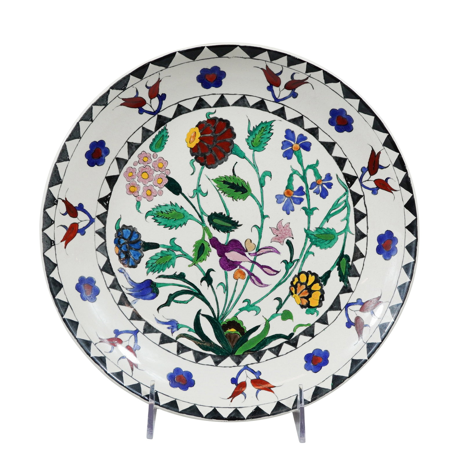 Wedgwood Hand-Painted Iznik Style Floral Earthenware Plate: This is a circular glazed earthenware plate manufactured by Wedgwood. The piece features hand-painted Wedgwood floral decoration in an Iznik style, centered with a bouquet of traditional motifs includ
