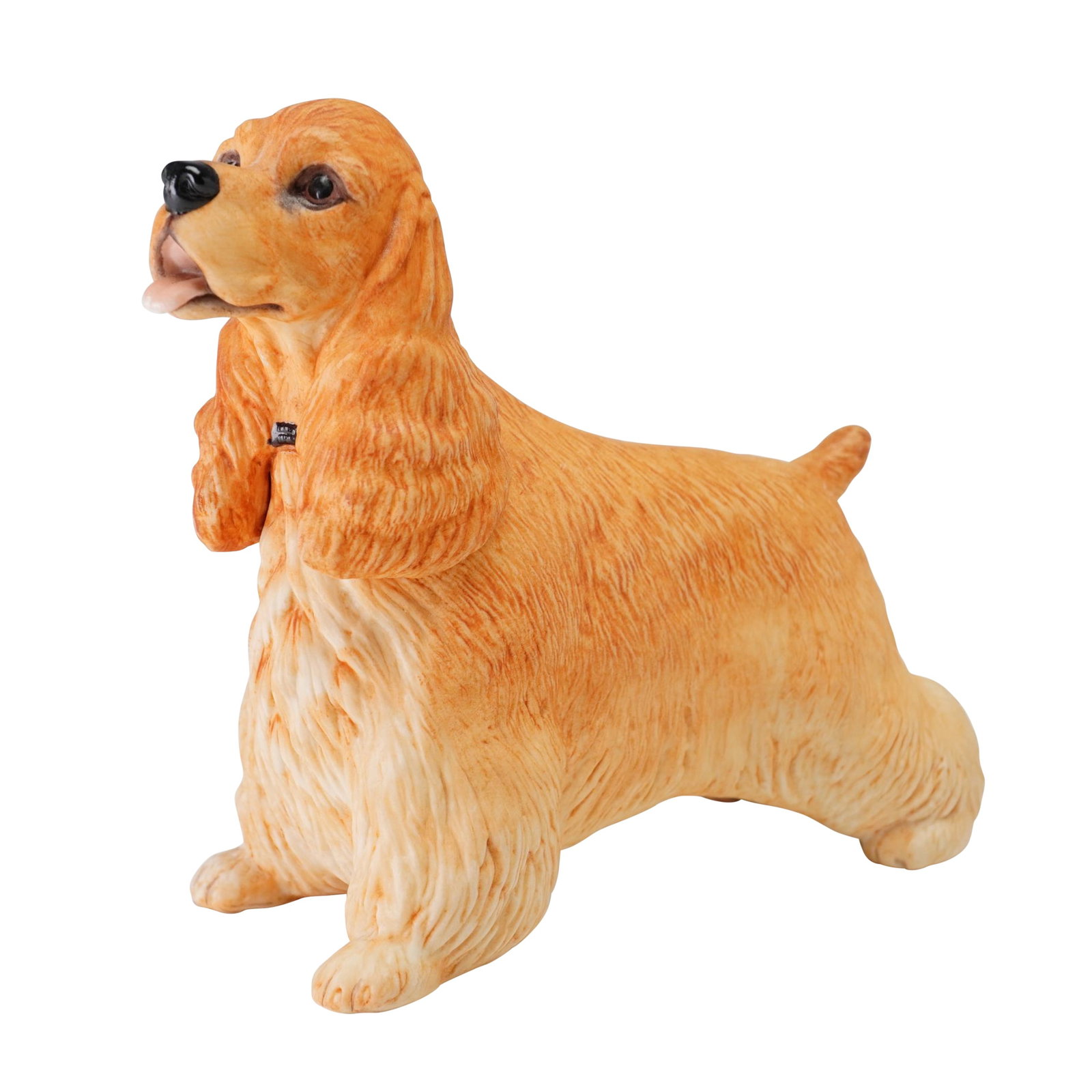Boehm USA Porcelain Figurine Cocker Spaniel 40142: This Boehm porcelain figurine depicts a Cocker Spaniel in a standing pose. The piece is crafted from hand-painted bisque porcelain with a buff or golden-colored coat, textured to simulate the appearan
