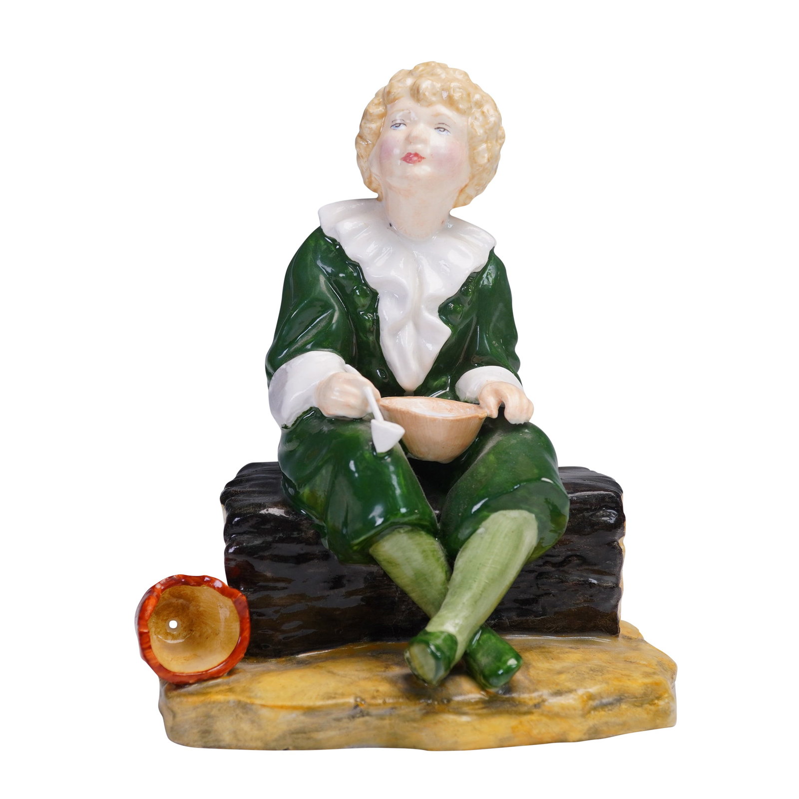 Reg Johnson and Sons Bone China Figurine, Bubbles: This hand painted bone china figurine titled Bubbles was produced by Reg Johnson and Sons in England. Depicting a curly-haired child in a green outfit with ruffled white collar, the figure is shown se