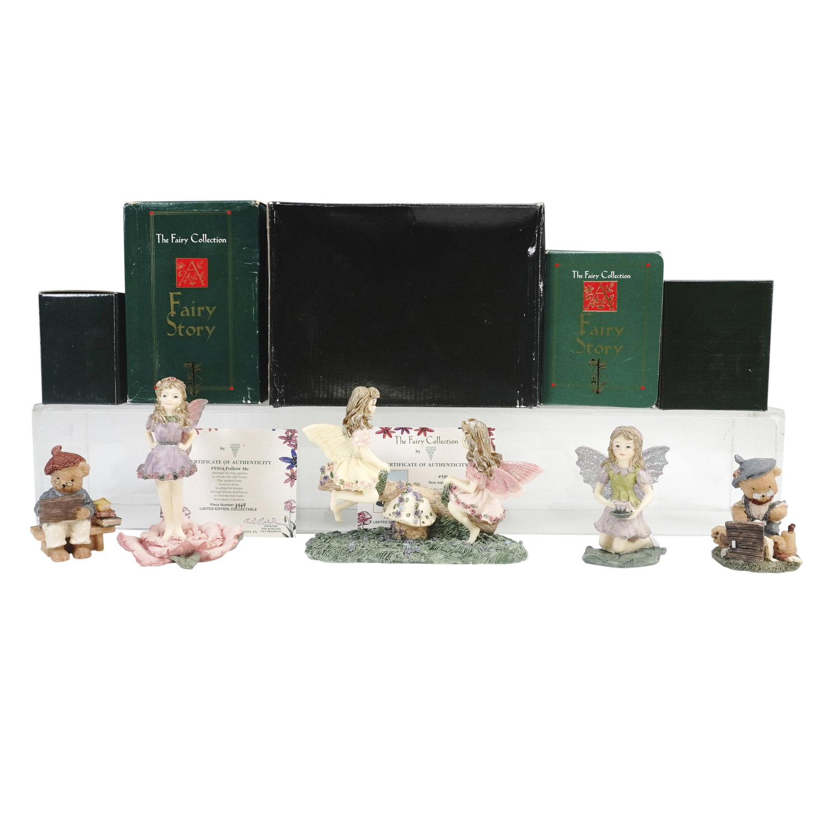 5pc Dezine The Fairy Collection and Artist Bear Figurines with Boxes: Assorted group of five hand painted resin figurines by Dezine Ltd from The Fairy Collection, including Follow Me item 5564, Tea Party Fairy item 5590, and See Saw Fairies item 5801. Also includes two 