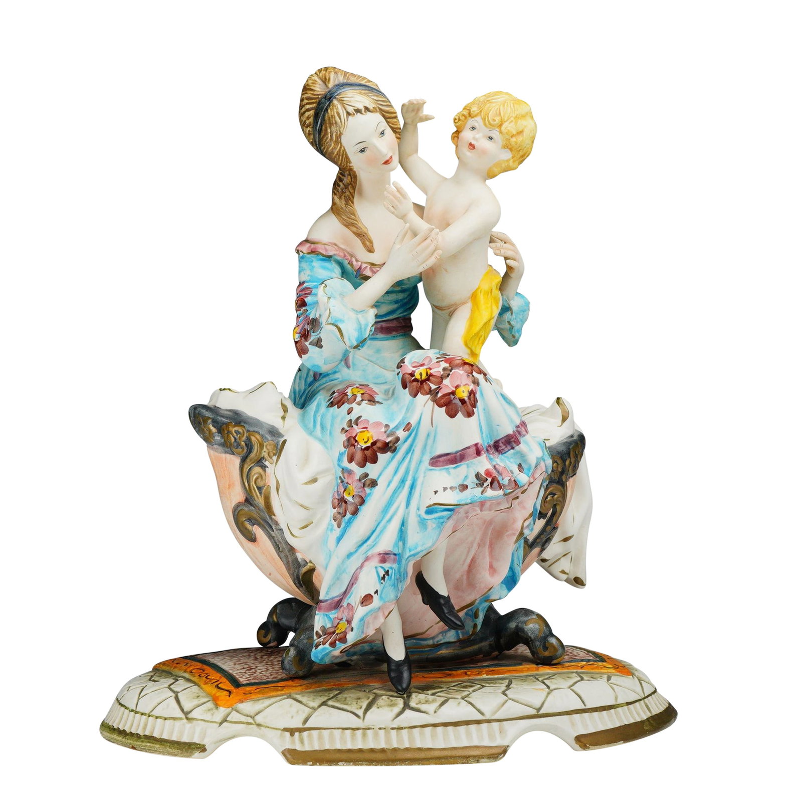 Capodimonte Made in Italy Hand-Painted Porcelain Mother and Child Figurine: This hand-painted porcelain figure produced in the Capodimonte tradition depicts a mother and child in a Rococo-revival style. The seated woman is dressed in an 18th-century style blue gown decorated 