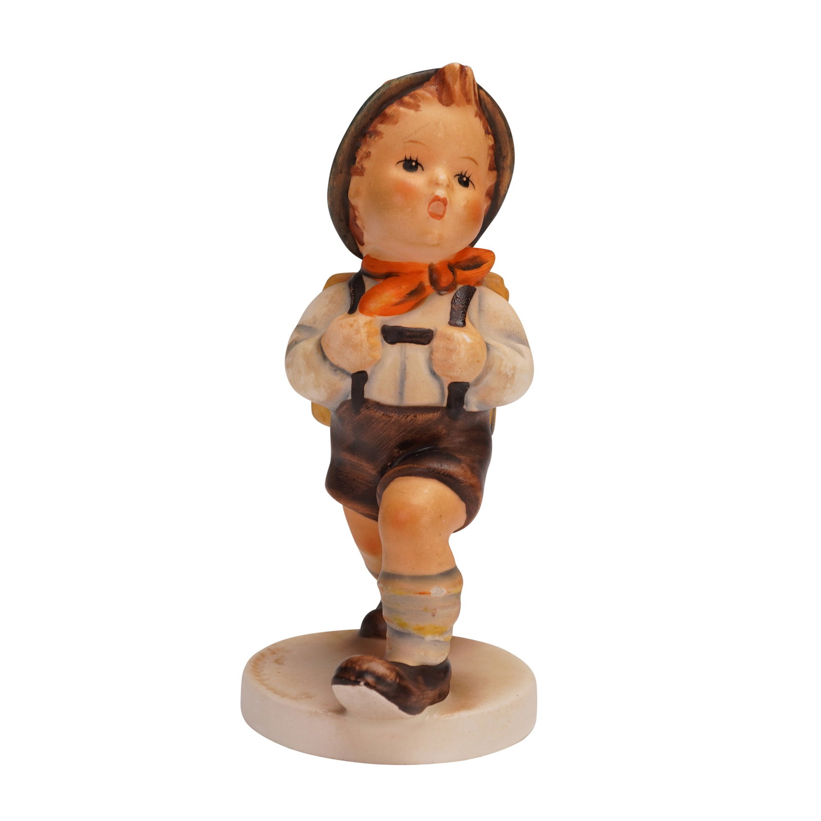 Hummel Figurine, School Boy HUM 82 2/0: This Hummel figurine, titled School Boy, was originally sculpted in 1935 and is model number HUM 82 2/0. The piece features a young boy with a backpack, hand-painted with attention to detail. Includes