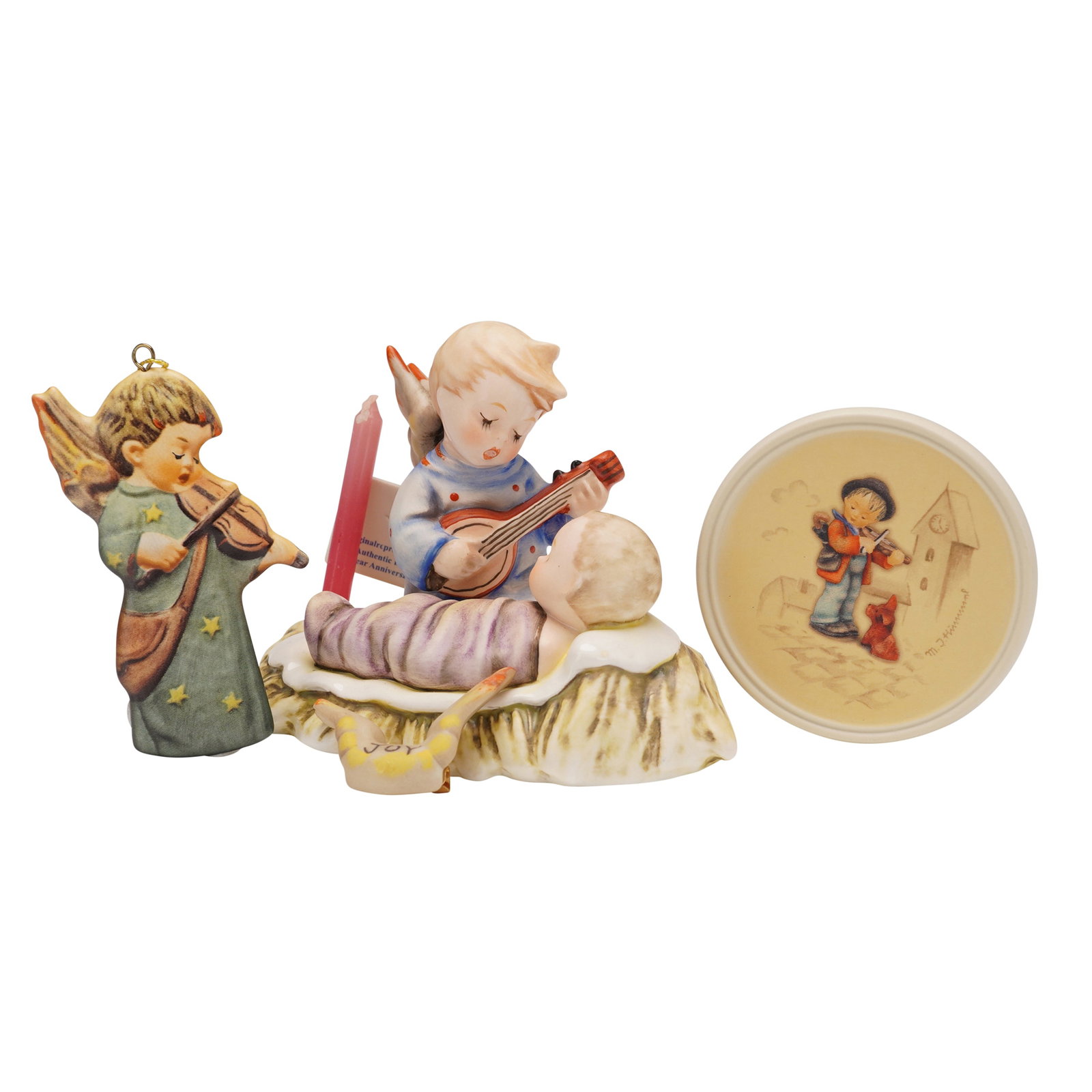 4pc Goebel Hummel Figurine, Pin, Ornament and Plaque: Collection of four Goebel Hummel pieces including a Puppy Love plaque in original box, a Lullaby figurine with candle marked 70th Anniversary Limited Edition 0165 of 1935, a Joy pin, and an angel orna