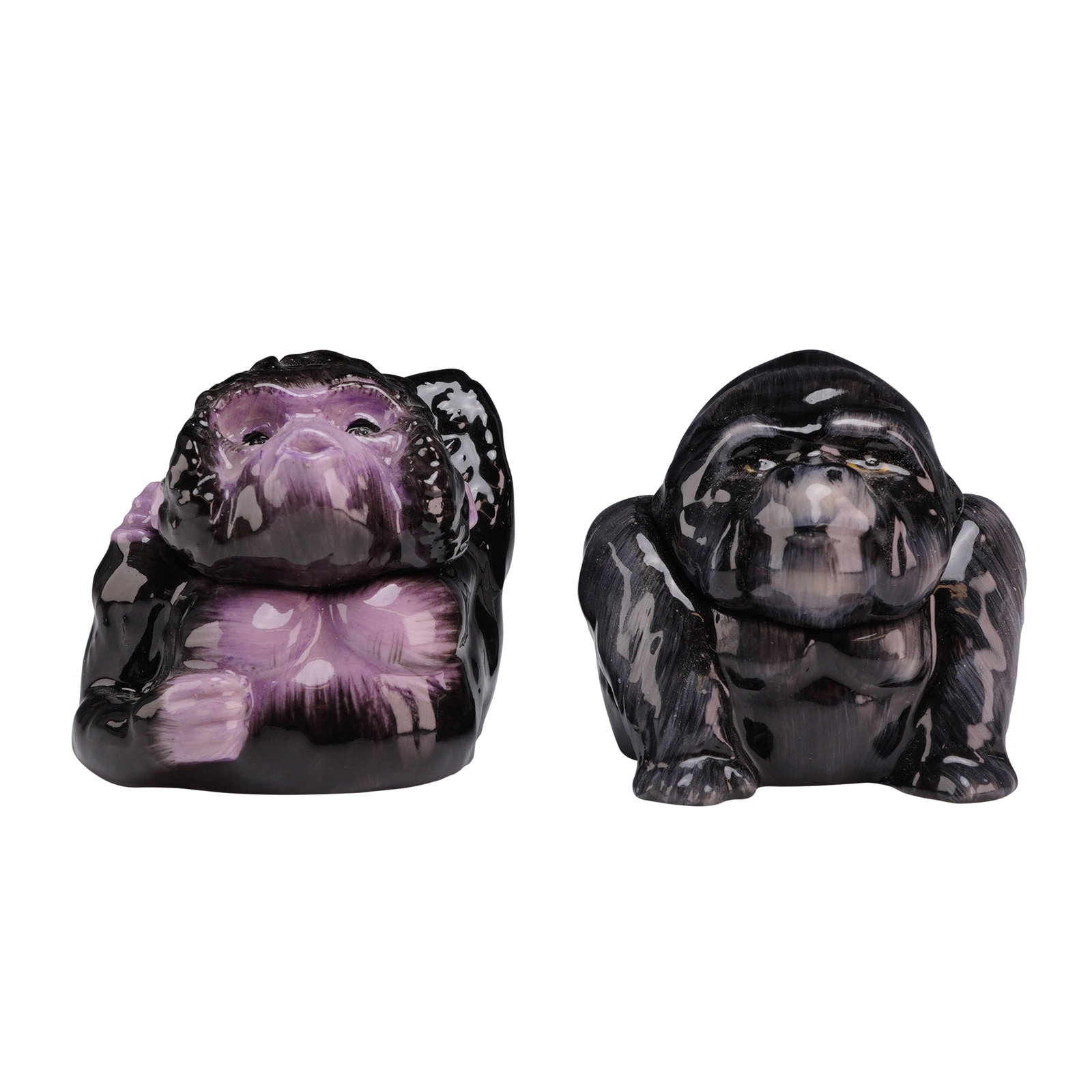 A Pair of Kevin Francis Face Pots, Clyde Prototype and Congo Gorillas: This pair of glazed ceramic lidded jars, known as Face Pots, was produced by Kevin Francis in England. Each piece consists of a pot base and a lid that forms the upper portion of the gorilla head. The