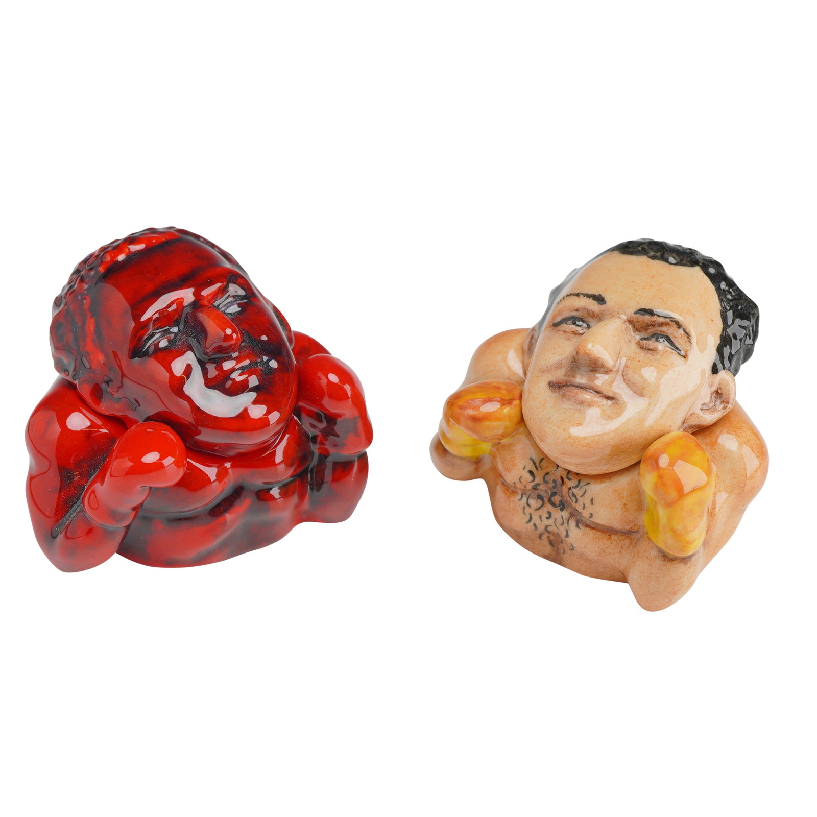 2pc Kevin Francis Face Pots, Including Signed and Prototype Fighters: A pair of glazed ceramic trinket boxes from the Face Pots collection by Kevin Francis, depicting a fighter in a defensive stance with gloves raised. The set consists of two versions of the same model.