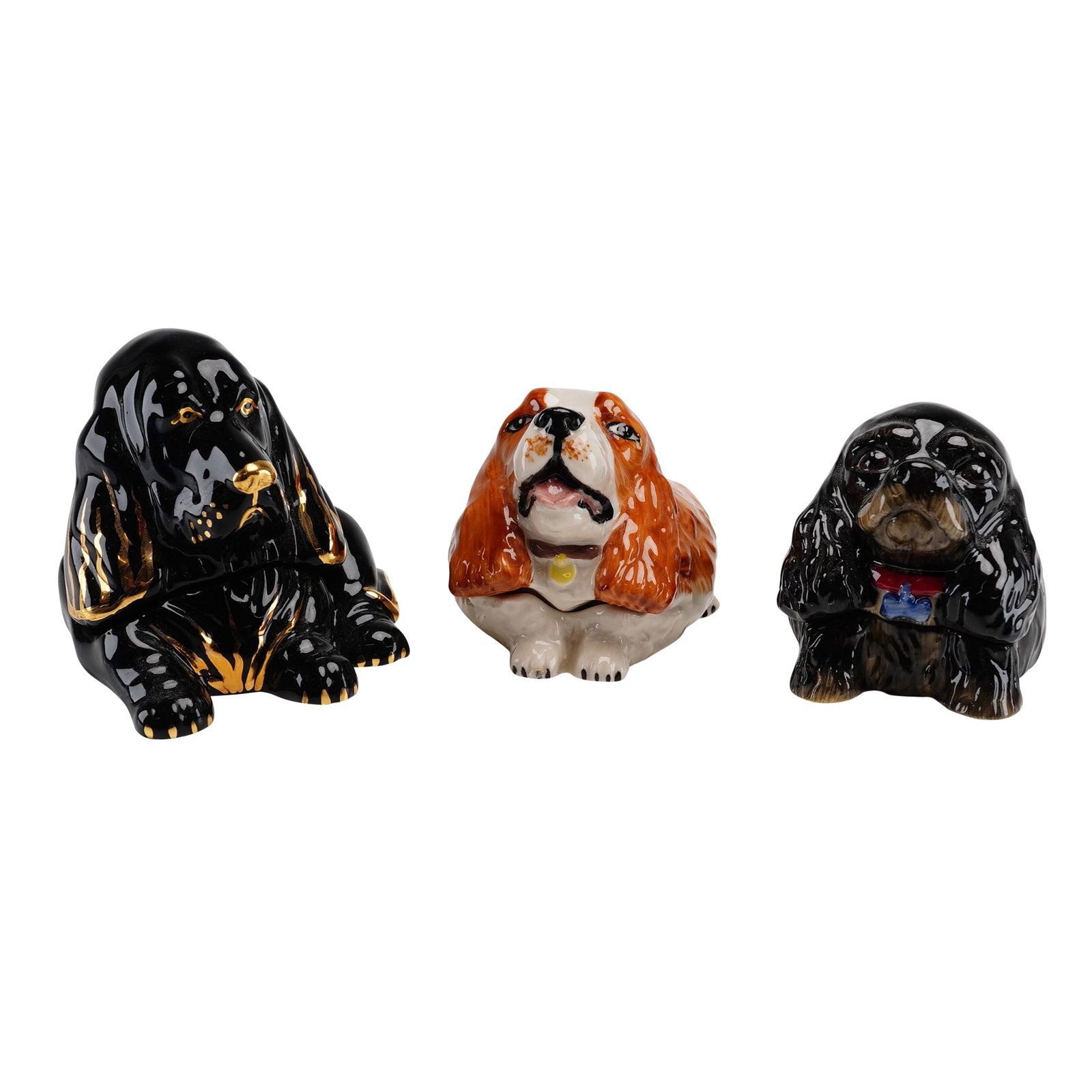 Lot of 3 Kevin Francis Face Pots Dog Trinket Boxes including Abagael and Spiro: A lot of three glazed porcelain lidded trinket pots from the Kevin Francis Face Pots collection, each modeled as a stylized dog. The collection includes a large black hound with gold luster highlights