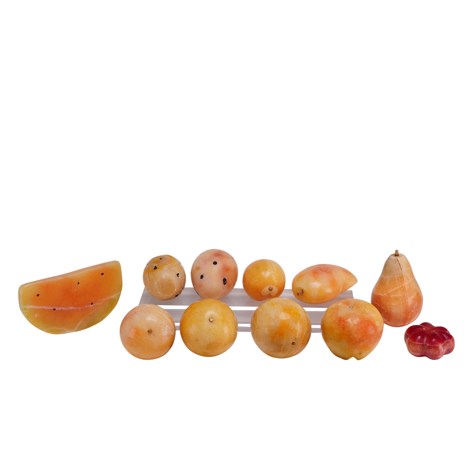 11pc Polished Stone Fruit in the Mid-Century Italian Style: An 11pc set of polished stone fruit, hand-carved in the mid-20th century Italian style. The collection is crafted from alabaster and includes a variety of forms such as a watermelon slice, a pear with