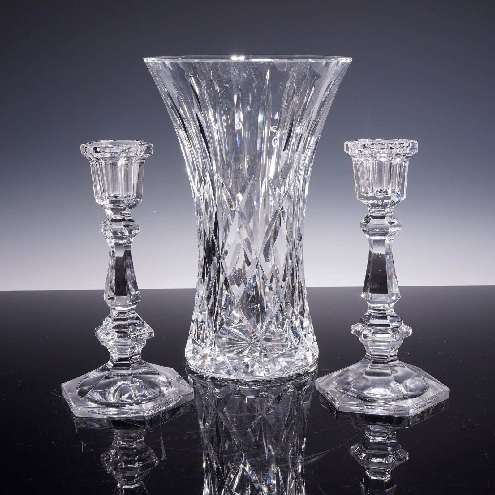 A Three-Piece Lot of Cut Crystal and Glass Comprising a Trumpet Vase and a Pair of Faceted (1 of 3)