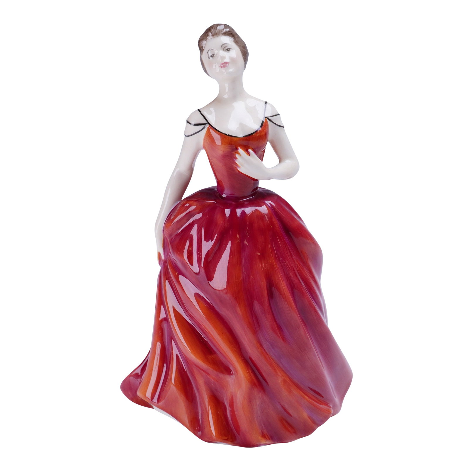 Royal Doulton Figurine, Innocence HN 2842: A figurative ceramic Royal Doulton figurine titled "Innocence." The piece is executed in glazed and painted bone china, depicting a woman in a voluminous, flowing crimson/red evening gown with painted