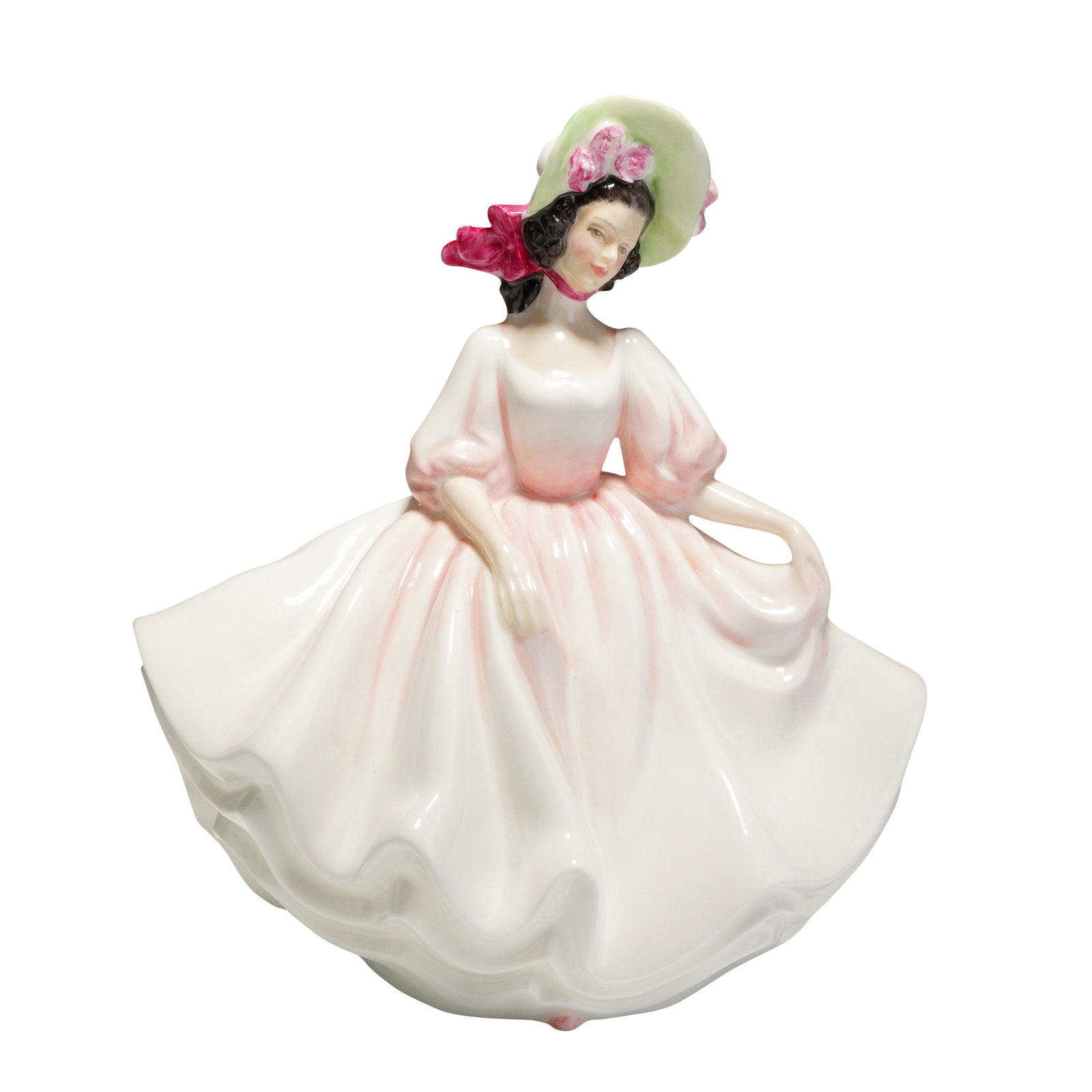Royal Doulton Figurine Sunday Best HN2698: A hand-decorated porcelain figurine by Royal Doulton, titled Sunday Best, modeled by Peggy Davies. The woman is depicted in a pale pink and white gown with voluminous sleeves and a flaring skirt, wear