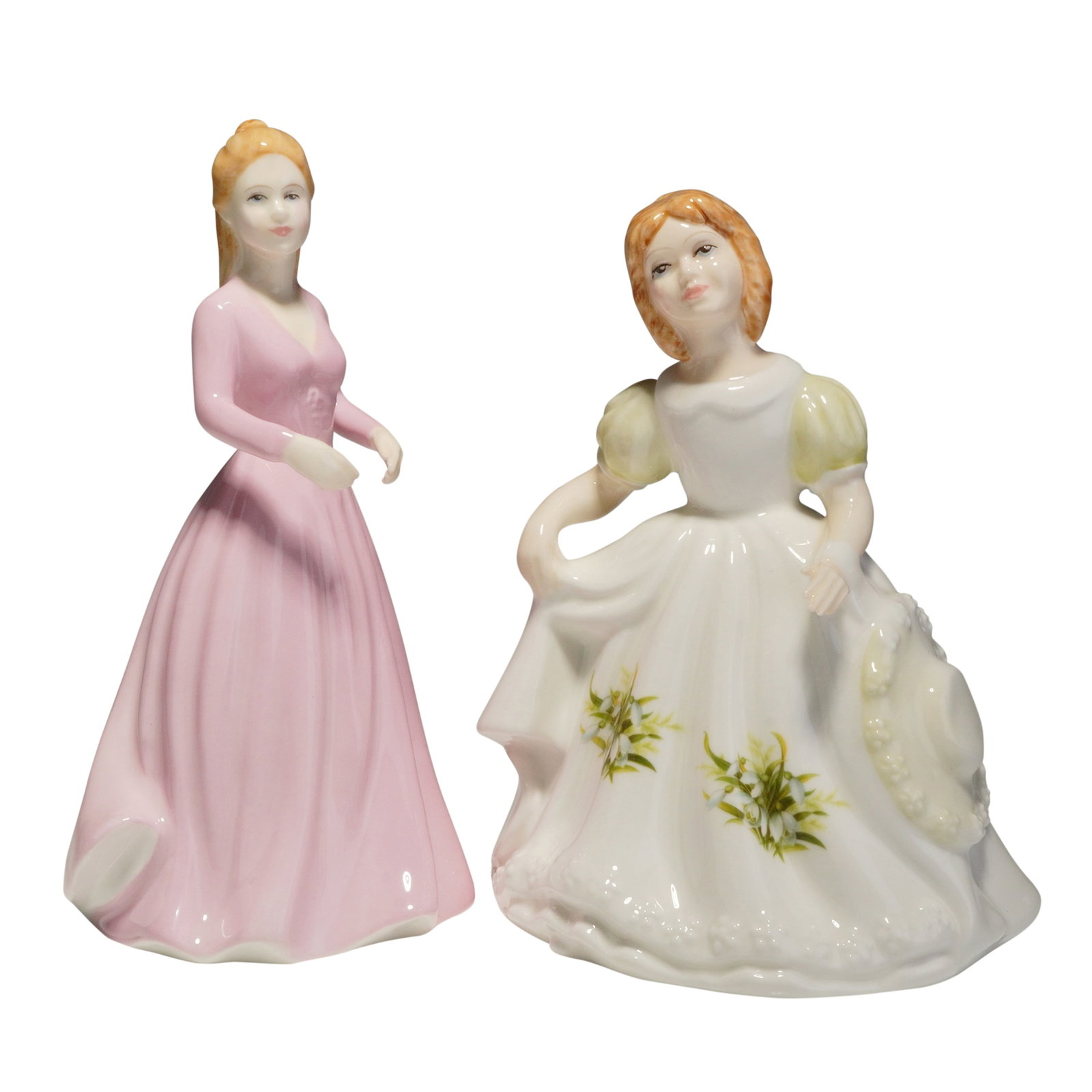 2pc Royal Doulton Figurines Magical Moments HN4607 and January HN3330: This lot consists of two Royal Doulton hand-decorated bone china figurines. The first, titled Magical Moments, was modeled by Nada M. Pedley and bears a 2003 copyright. It depicts a female figure in a