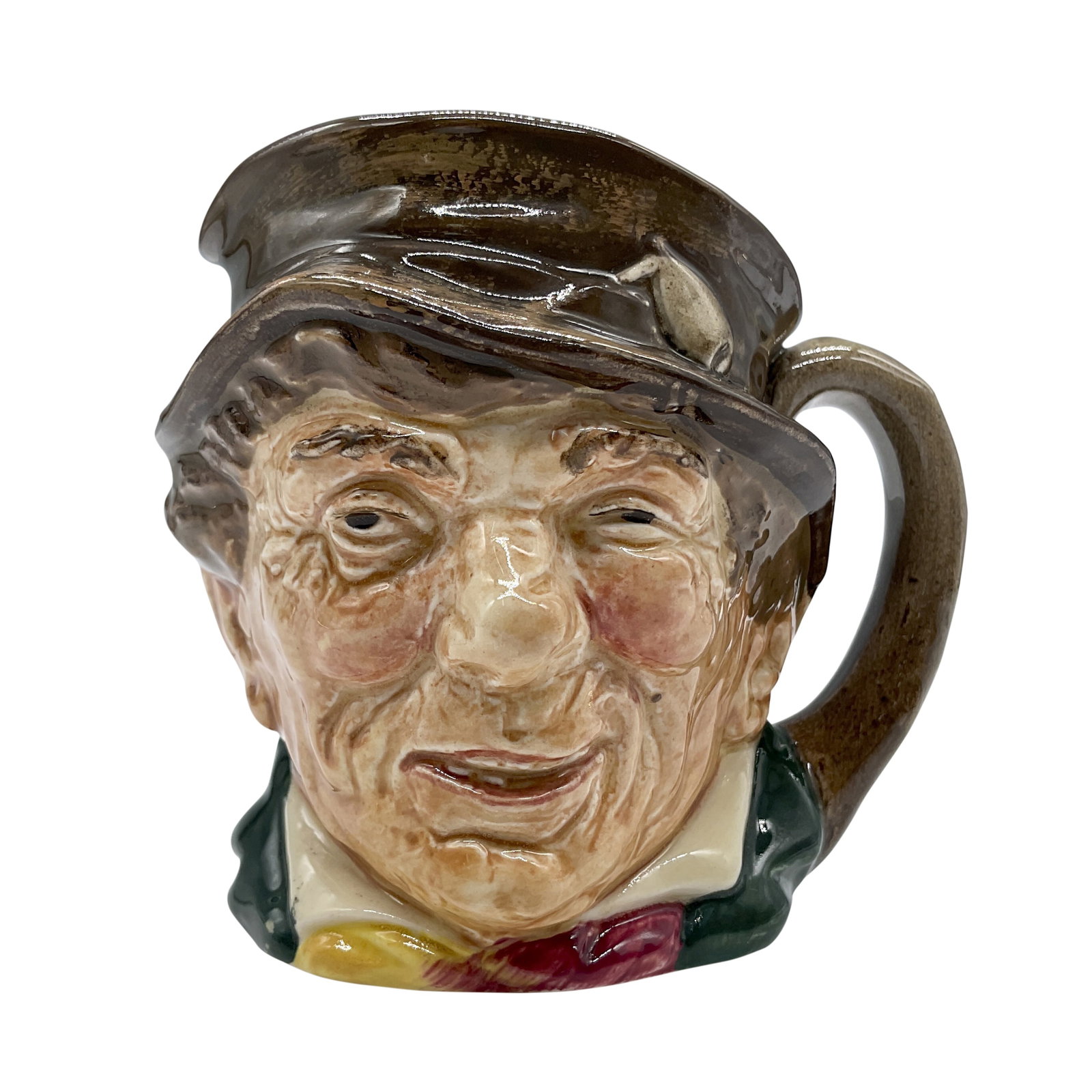 Paddy D5768 - Small - Royal Doulton Character Jug: Brown hat; green coat; yellow and red scarf. Royal Doulton backstamp. Artist: Harry Fenton Dimensions: 3.25"H Date or Era: 1937 - 1960 Manufacturer or Brand: Royal Doulton Country of Origin: