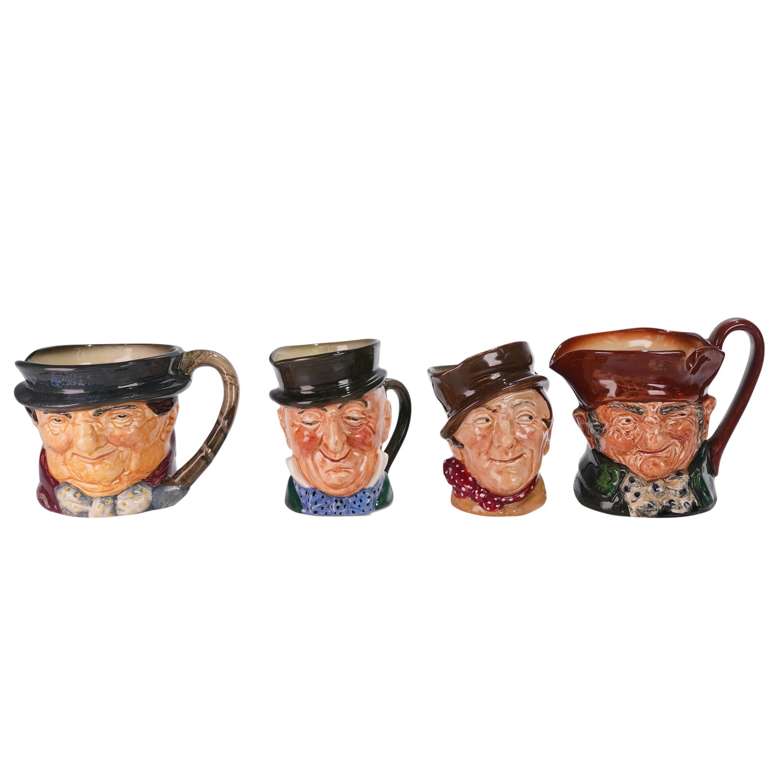 4pc Royal Doulton Character Jugs-Old Charley, Tony Weller, Micawber & D5841: A group of four Royal Doulton character jugs inspired by Charles Dickens' classic novels, including Old Charley D5527, Tony Weller D5530, Micawber D5843, and Sam Weller D5841. These mid 20th century j