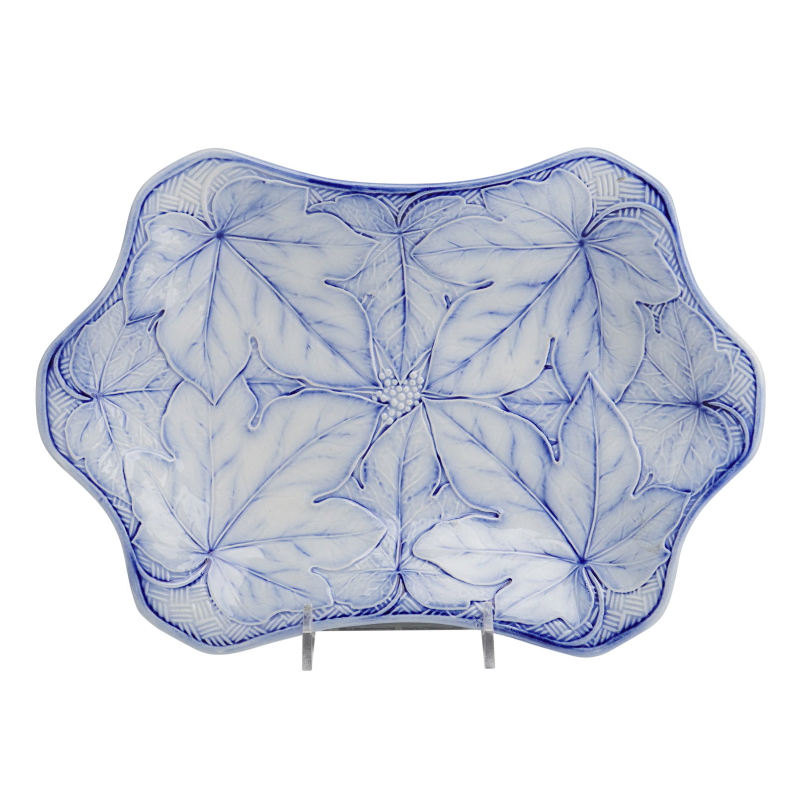 Wedgwood White and Blue Relief Leaf Patterned Tray in the Water Lily Pattern: A Wedgwood white and blue relief leaf patterned tray in the Water Lily pattern. This relief-molded ceramic dish of undulating rectangular form features a design of large overlapping leaves radiating f