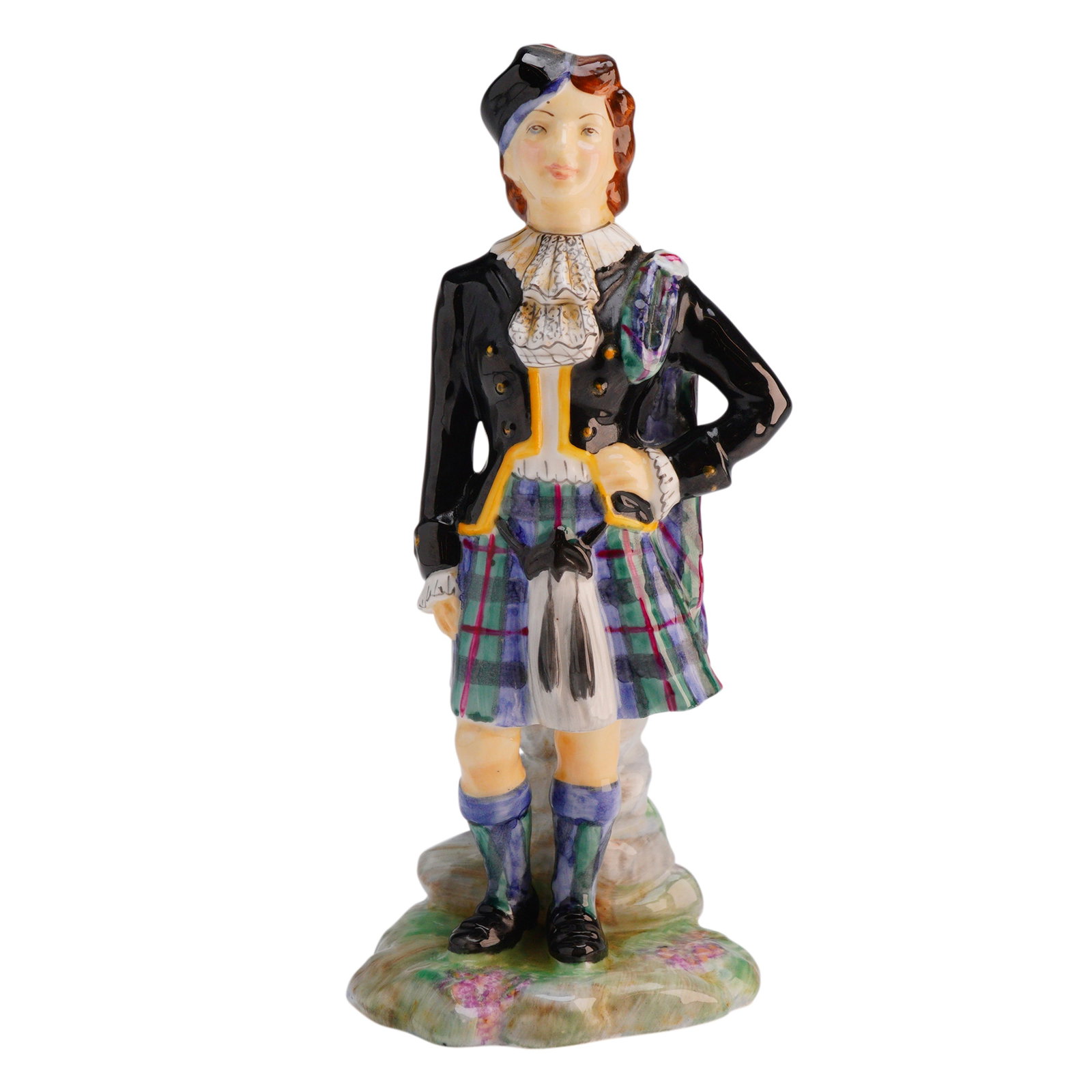 Radnor Bone China Figurine Scottish Highlander Campbell Tartan: A single glazed bone china figurine by Radnor, depicting a Scottish Highlander or Laird. The figure is dressed in traditional Highland attire, including a plaid kilt, a black gloss jacket with yellow 