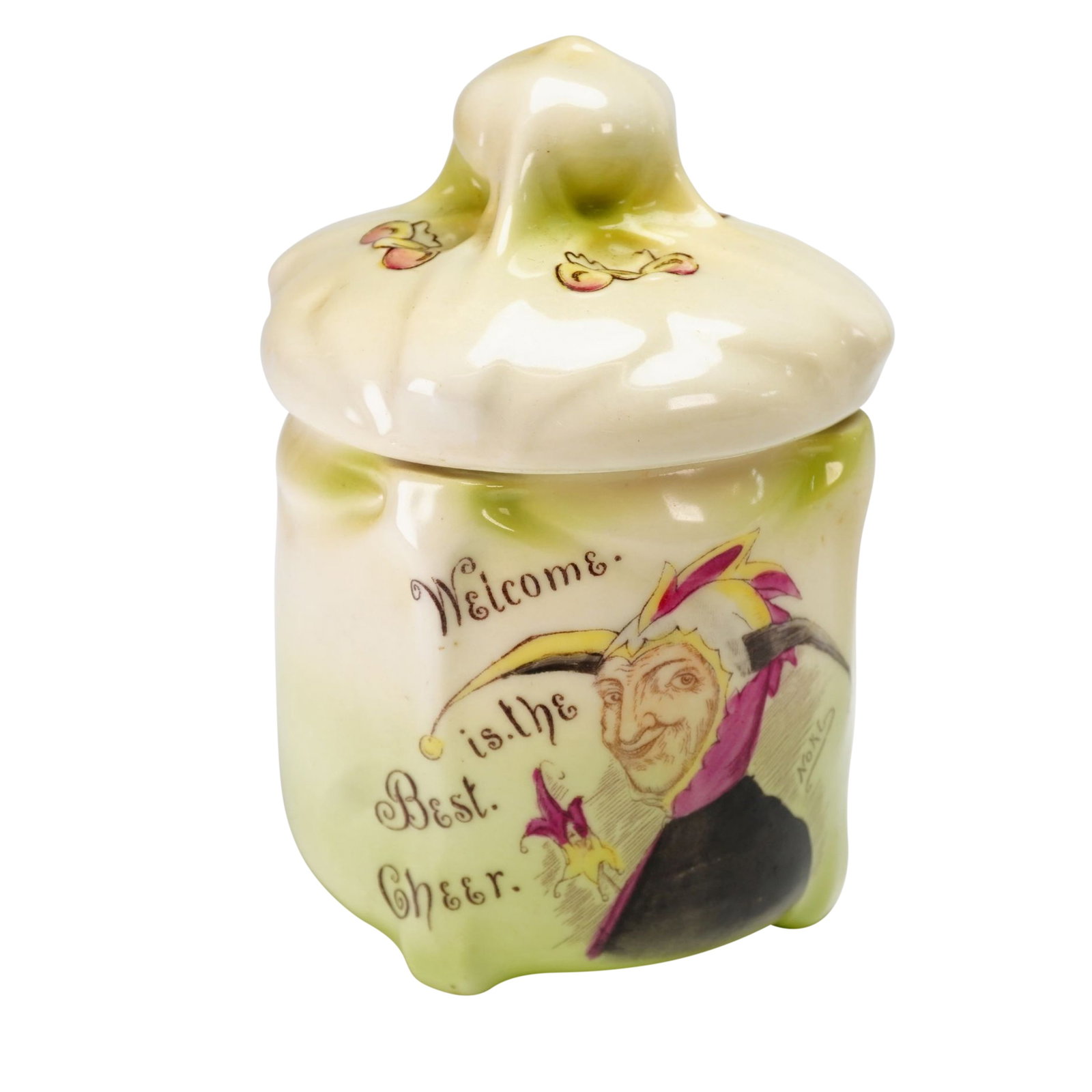 Royal Bayreuth Porcelain Jester Tobacco Jar with Lid: A fine Royal Bayreuth porcelain tobacco jar or lidded canister featuring a molded, slightly lobed body with a soft gradient glaze transitioning from pale green to cream. The obverse is decorated with 