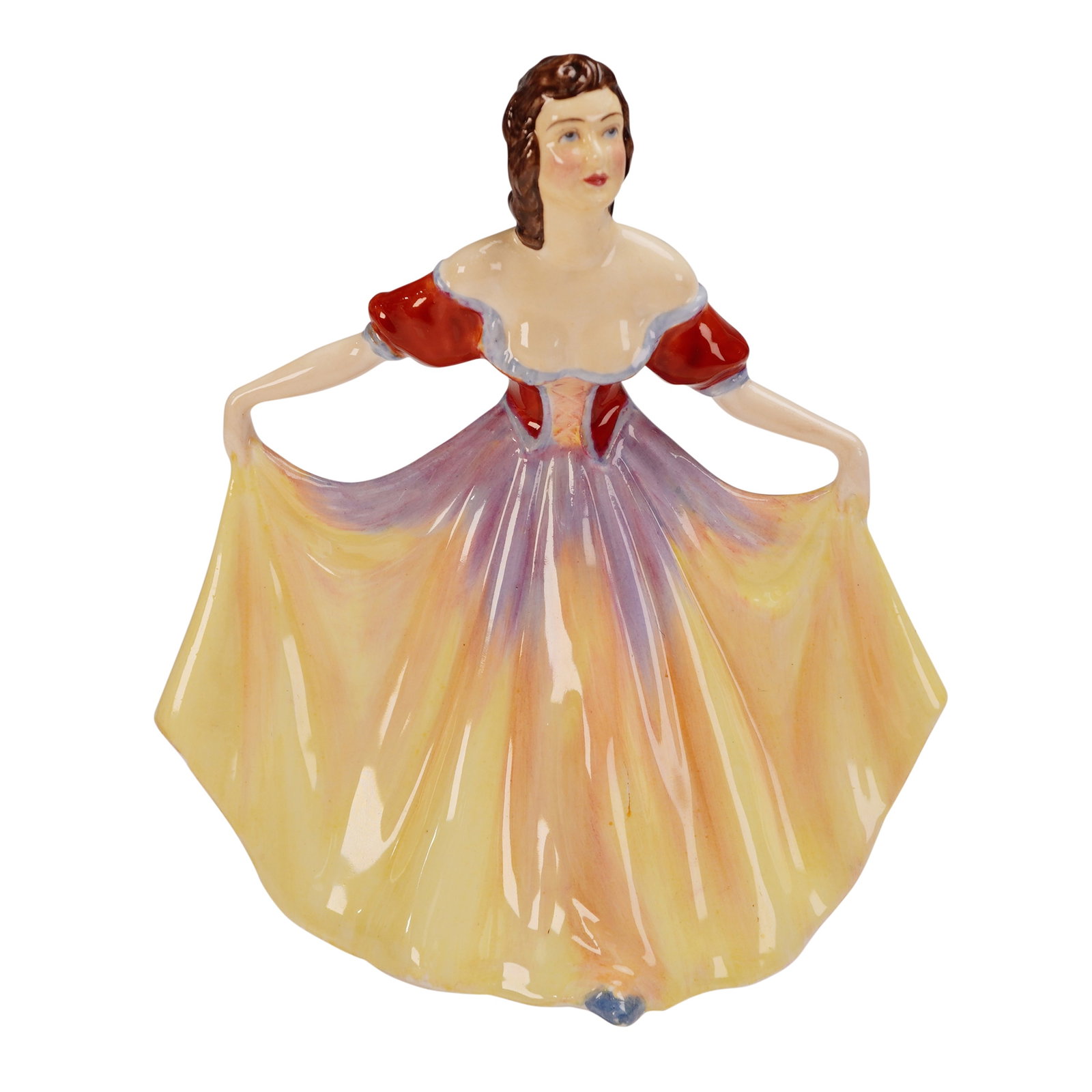 Paragon China Figurine Kaitlyn: Paragon fine bone china figurine titled Kaitlyn. This graceful figure depicts a lady in a full-skirted gown with a red bodice and soft yellow and lilac flowing panels, posed with arms extended as she 