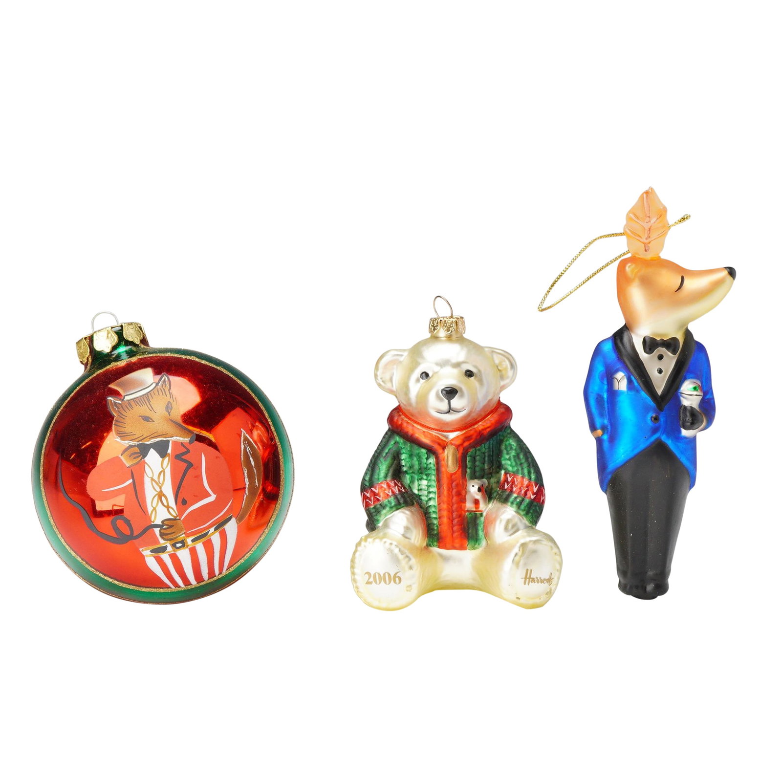 3pc Harrod's, Pottery Barn, and Dapper Fox Portrait Christmas Tree Ornaments: This collection of three animal-themed Christmas tree ornaments features distinct festive designs. The first piece is a 2006 Harrods teddy bear ornament, finished in a white-gold color, wearing a clas