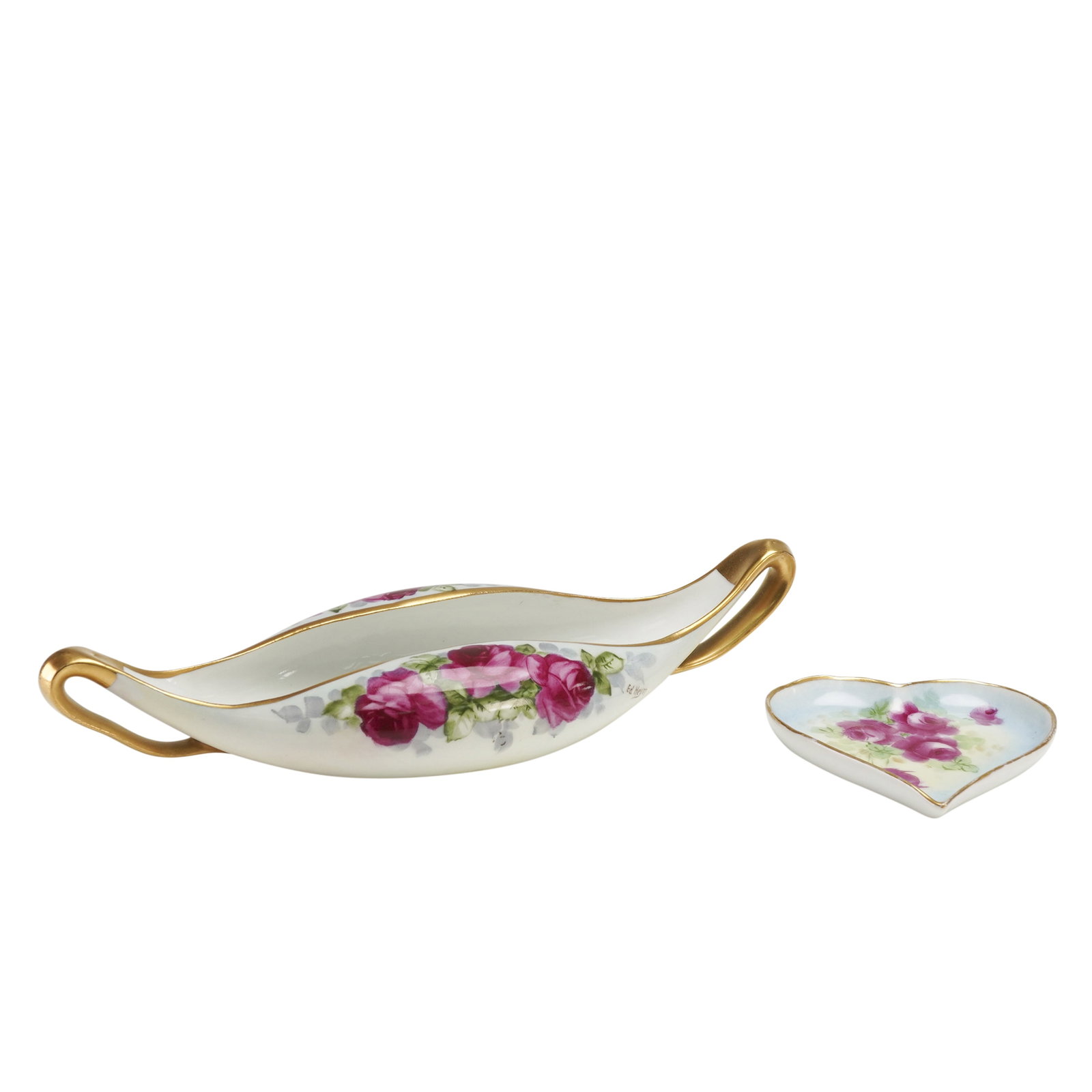 2pc Hand Painted Austrian & Bavaria Floral Dishes: Includes an elegant Austrian hand-painted dish featuring vibrant red roses by artist Ed Heyn, alongside a heart-shaped dish adorned with red roses by William Wands, marked Bavaria. The elongated oval 